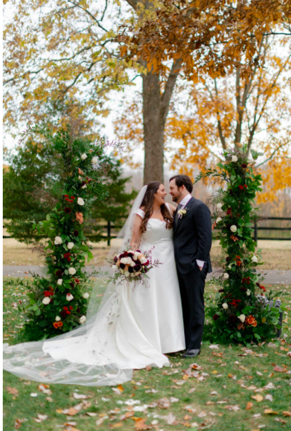 Off set, or broken arch at an outdoor wedding ceremony.
