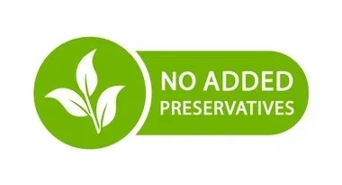 Green circular icon with a white leaf and a branch symbol, next to a green rounded rectangle containing the text 'NO ADDED PRESERVATIVES'.