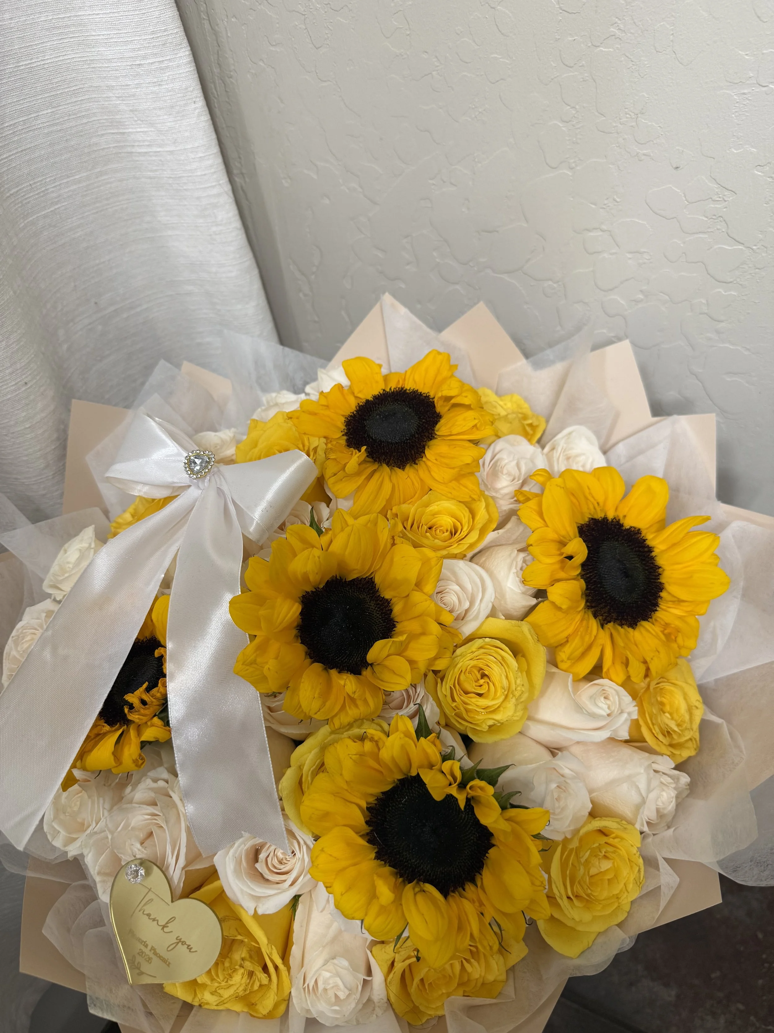 50 roses, Sunflowers, Bow, and cotton filler