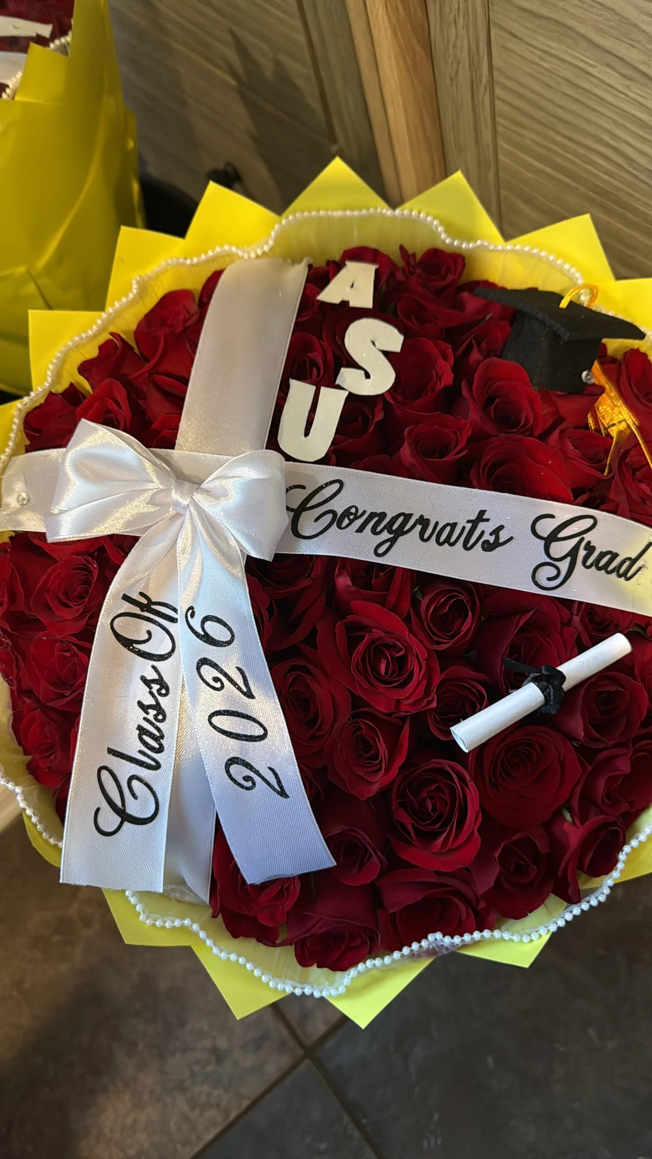 Celebrate every achievement with personalized graduation bouquets featuring ribbons, school colors, photos, money, and custom details.