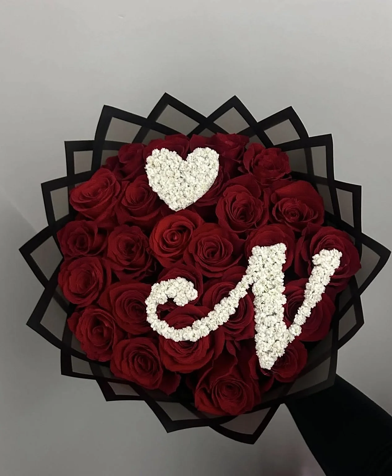 25 roses, floral letter, floral heart, and black frost paper