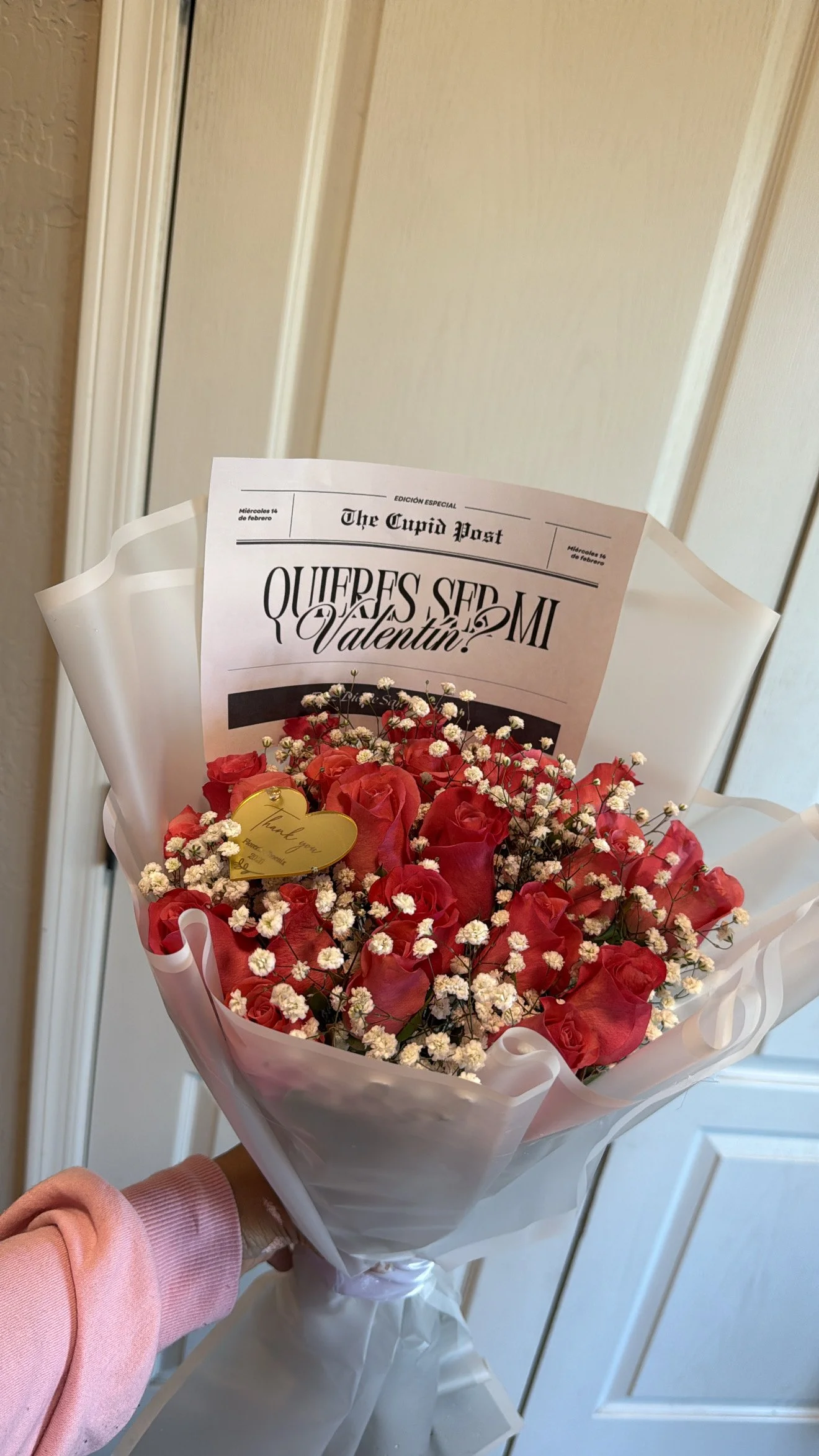 25 roses, baby breath, with custom newsletter for any event