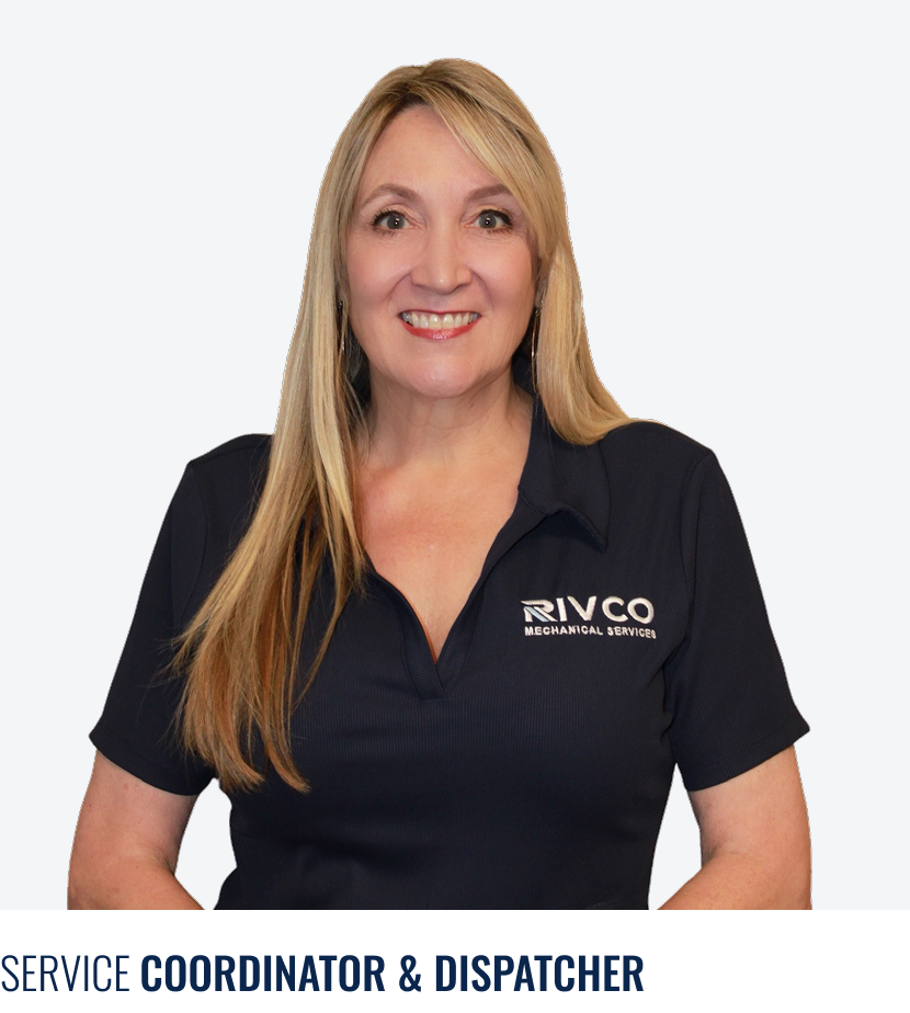 A woman with long blonde hair smiling, wearing a black polo shirt with 'RIVCO Mechanical Services' logo, standing against a light background.