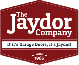 Logo of The Jaydor Company with text about garage doors and established date 1965.