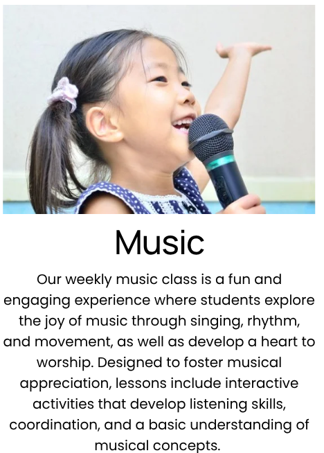 Young girl with a ponytail singing into a microphone, smiling, with a neutral background.