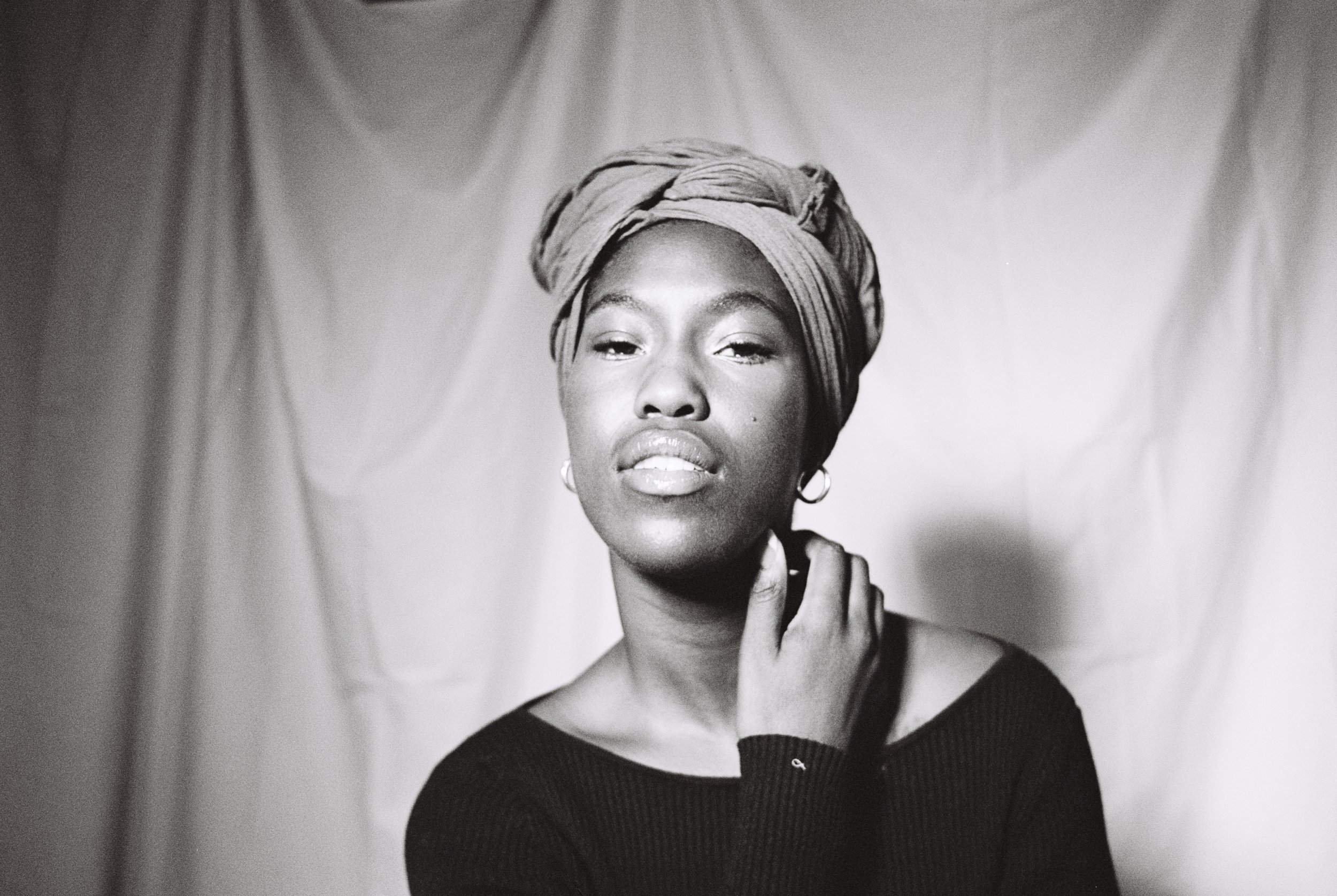 Half-body framing of Ismatu