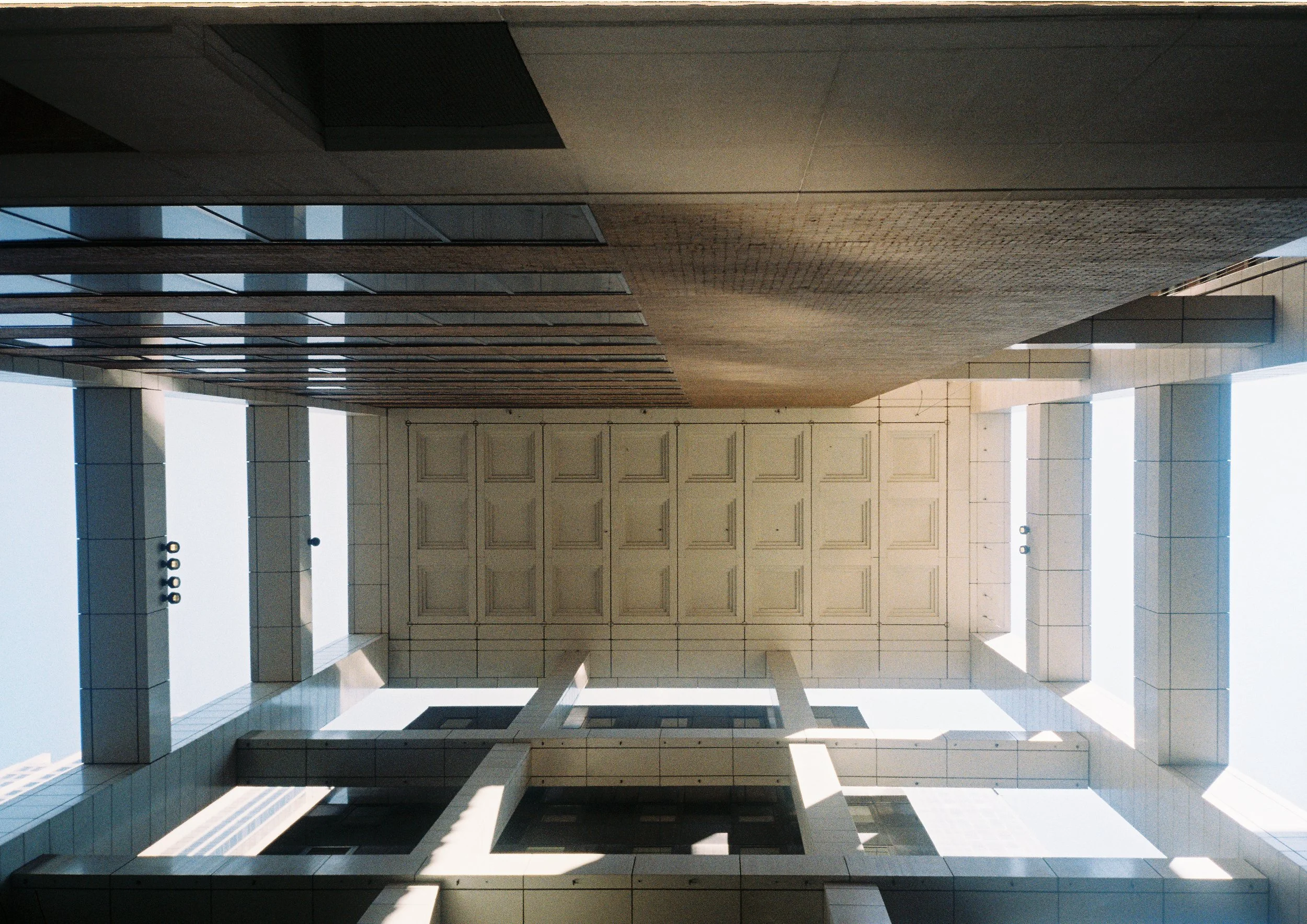 Geometric view of awning between tall city buildings