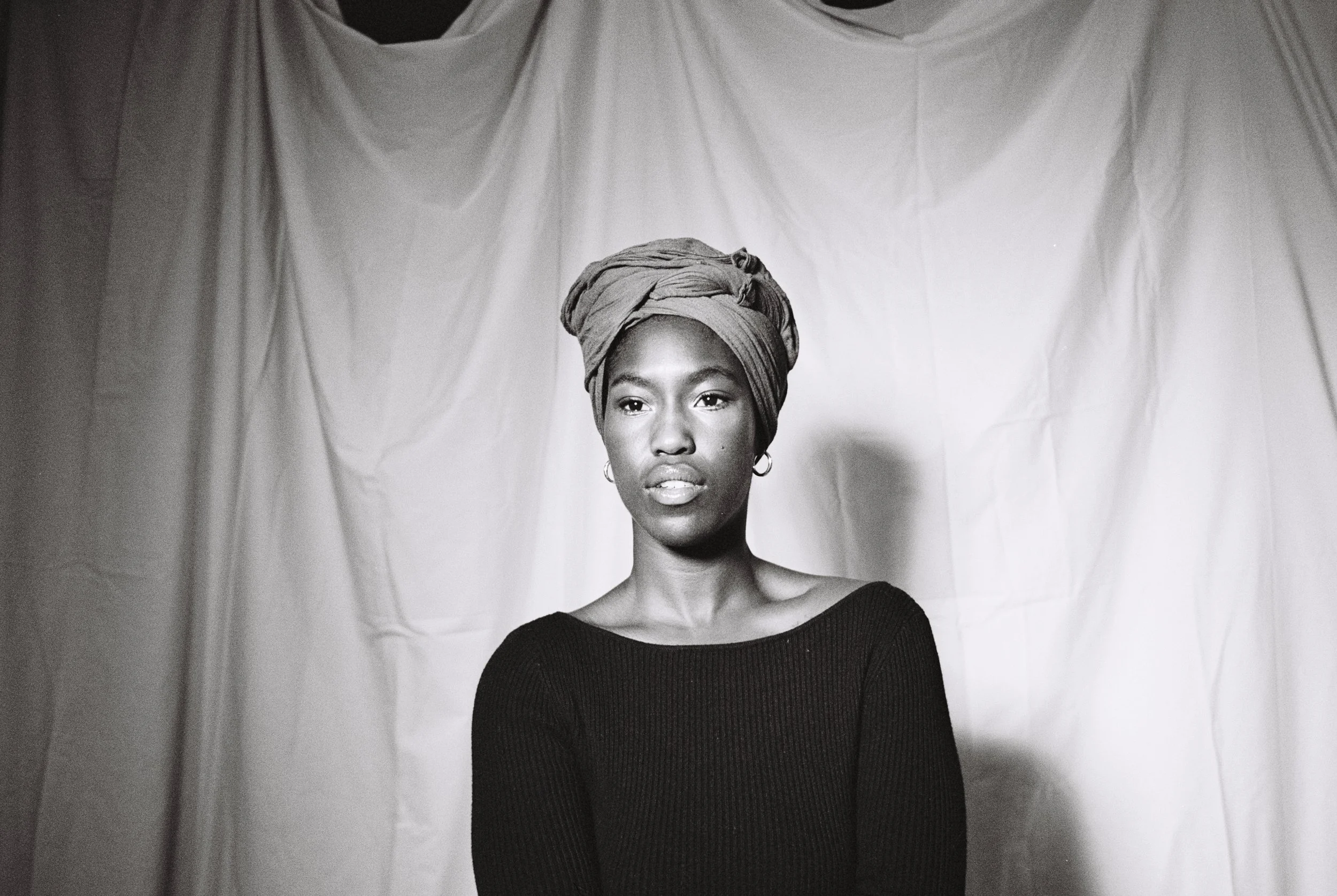 Half-body framing of Ismatu