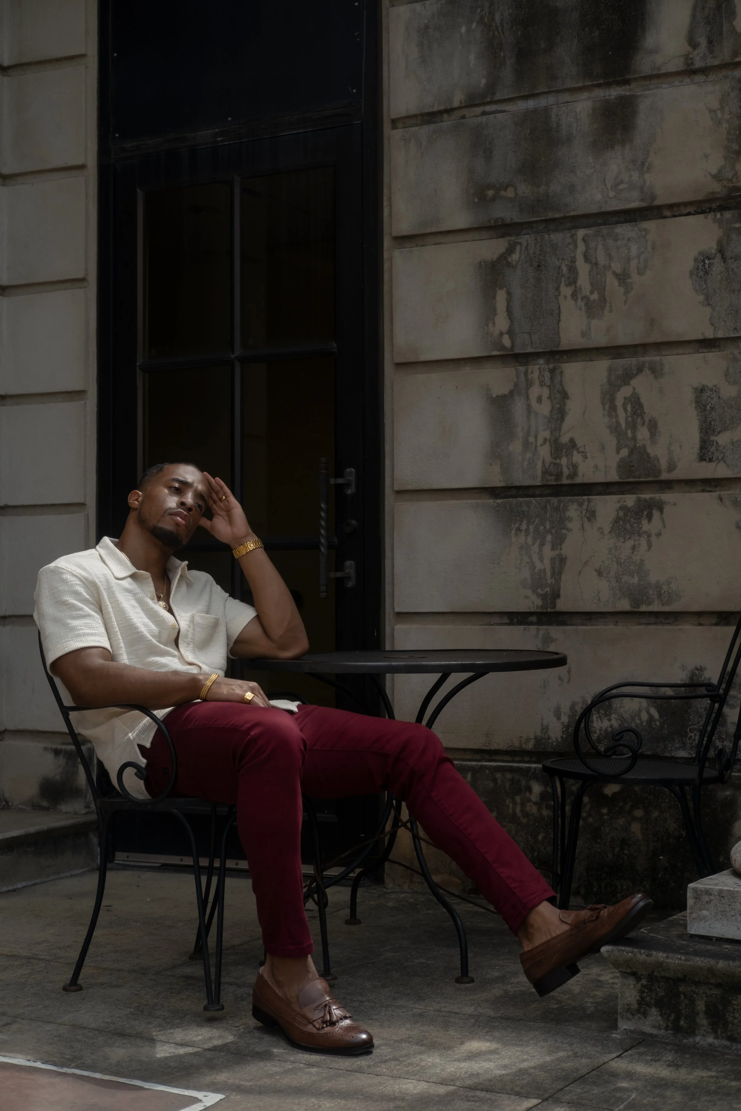 Full-body framing of Corey