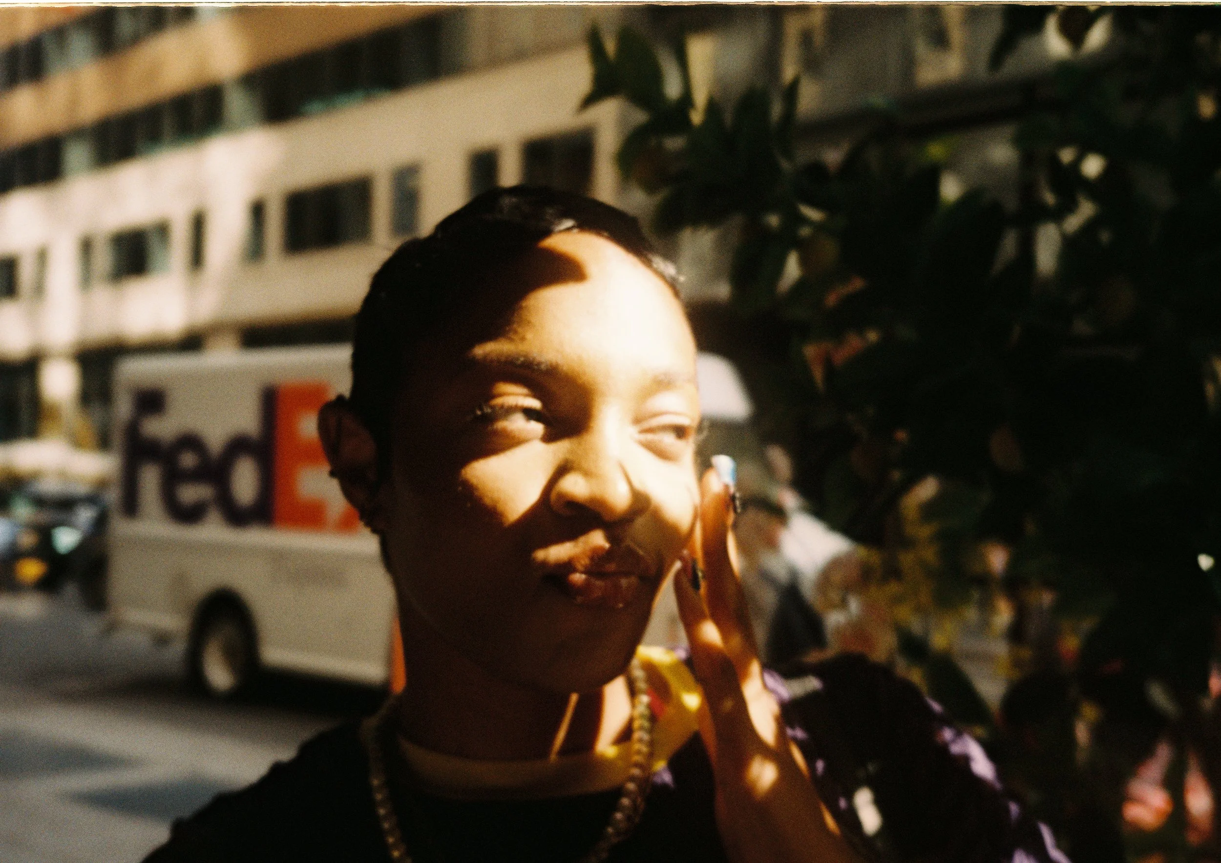 Close-up framing of Noelle on street