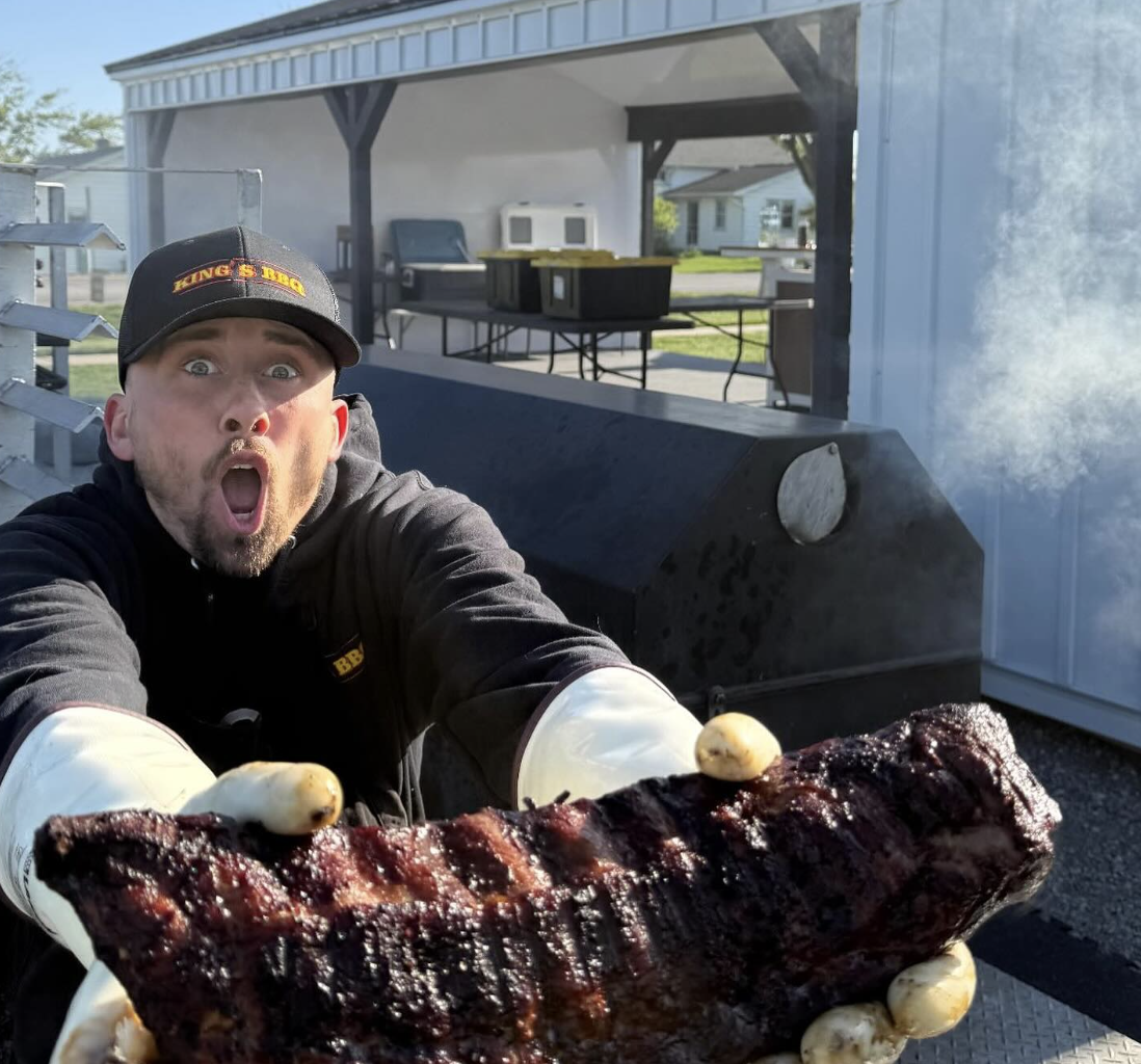 BBQ team preparing food for large fundraiser event in Goshen, Indiana.