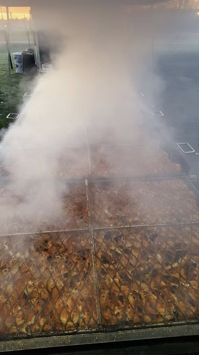 Barbecue preparation by Kings BBQ in Goshen, Indiana for a fundraiser or community event.