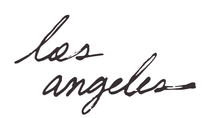 Stylized handwritten text that reads 'less angels' in black ink.