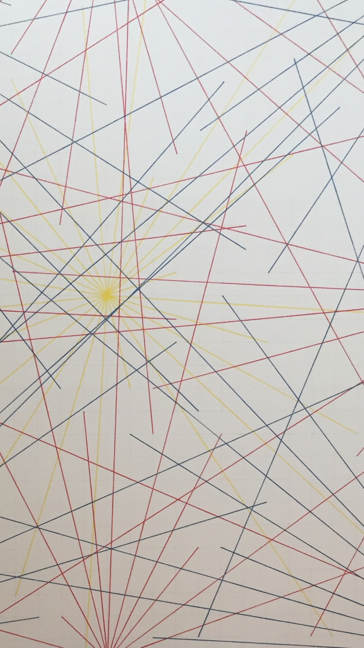 Abstract artwork featuring numerous intersecting lines in red, blue, black, and yellow, radiating from a central point on a white background.