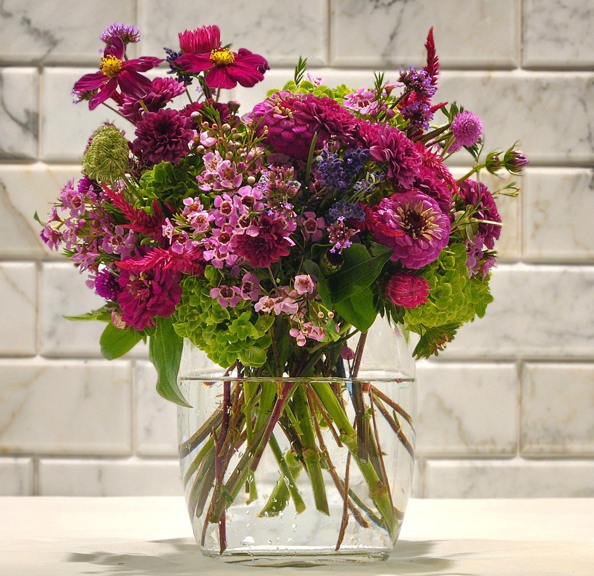 Wedding rehearsal flowers, fuschia and magenta cosmos