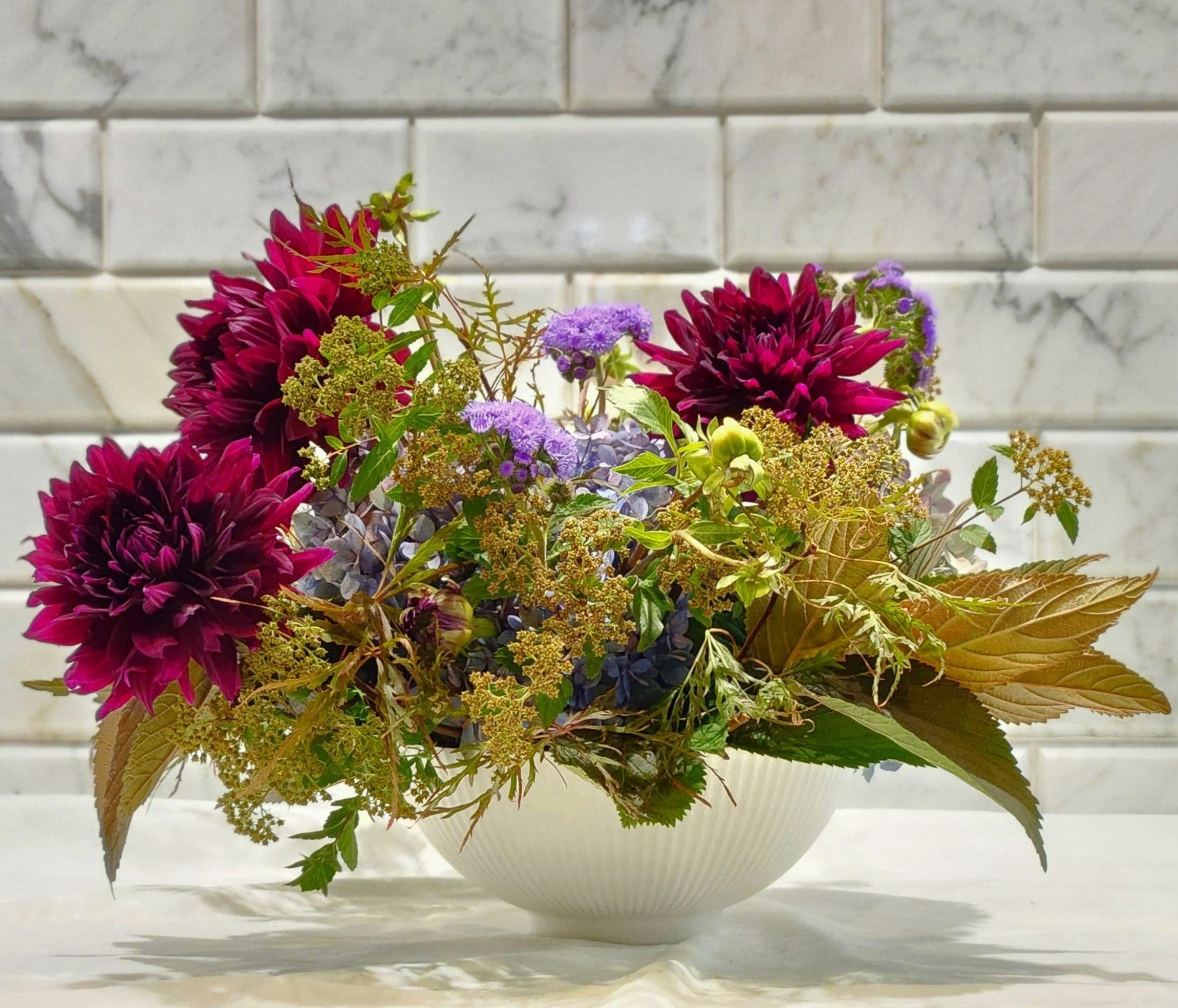 Lush engagement party centerpiece, autumn cabernet dahlias