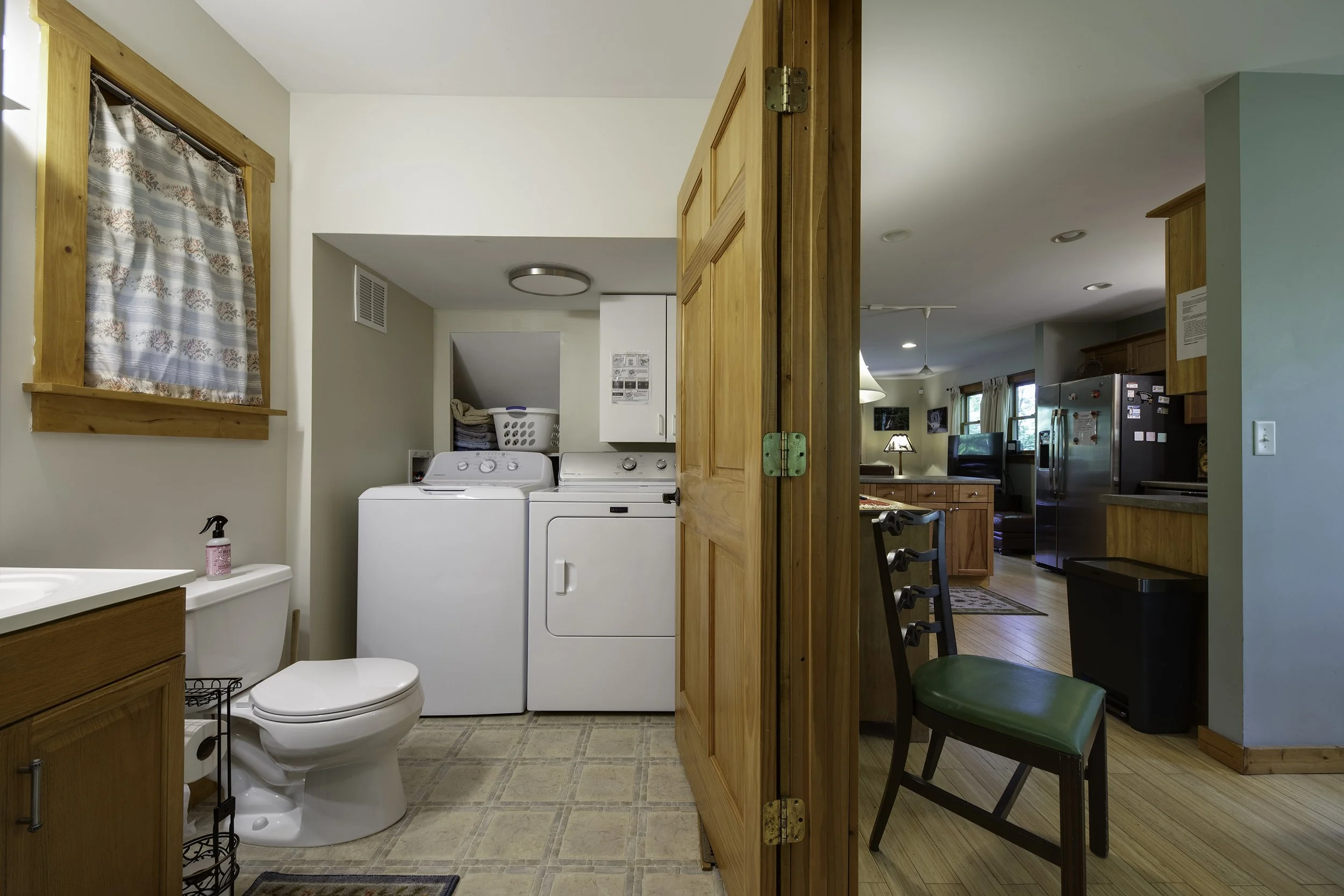 Main floor full bathroom with laundry