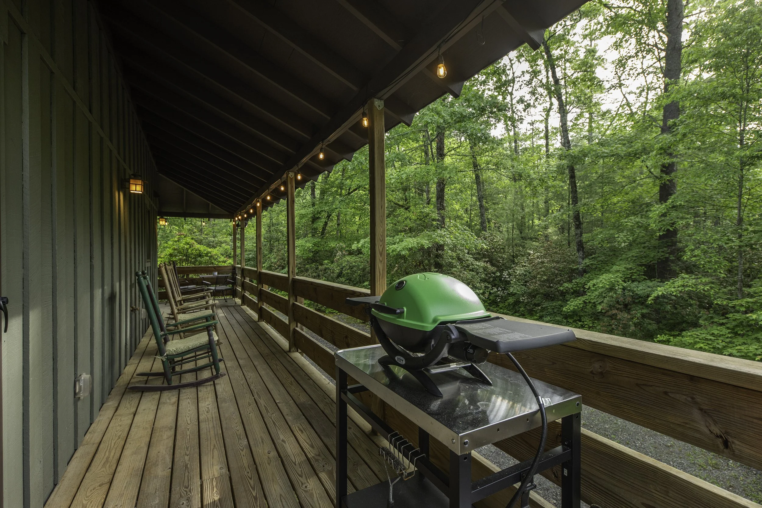 Large covered deck with cute Webber gas grill. Charcoal grill also available.