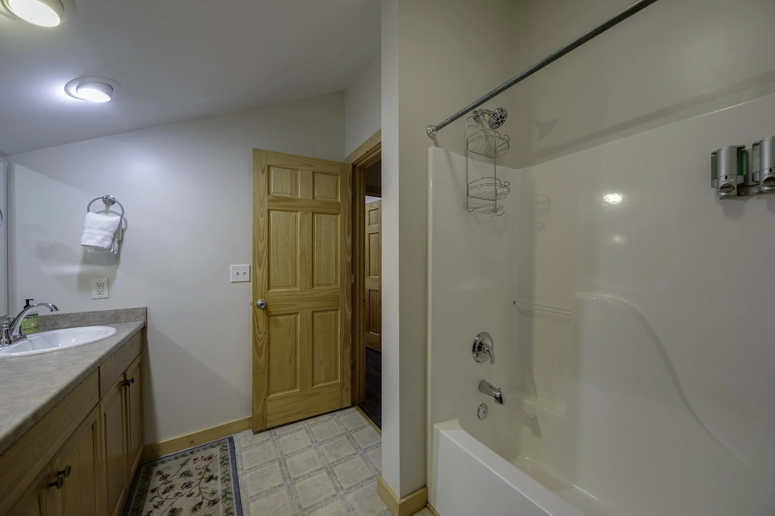 Upstairs bath has tub/shower combo
