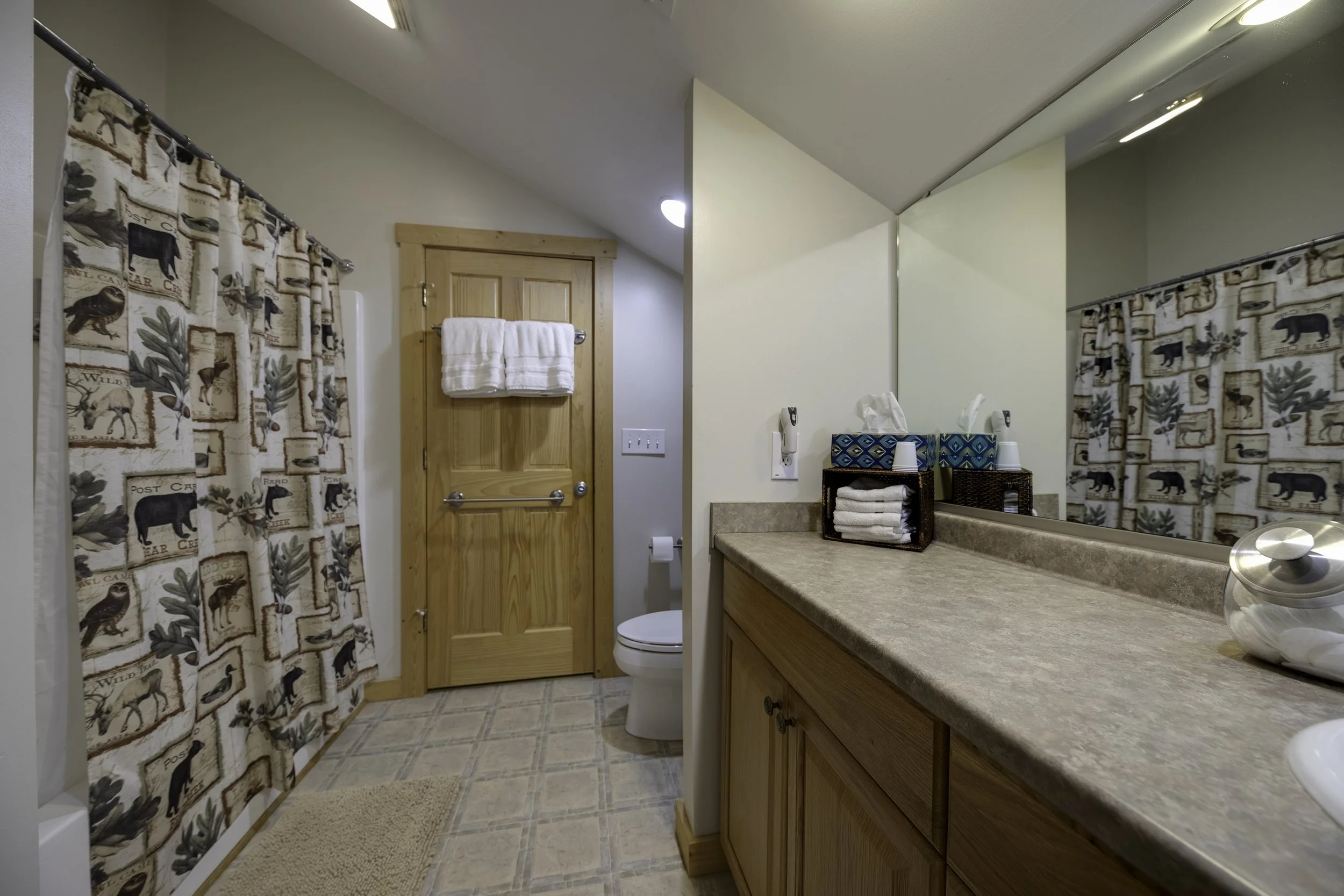 Upstairs bath has door into main bedroom