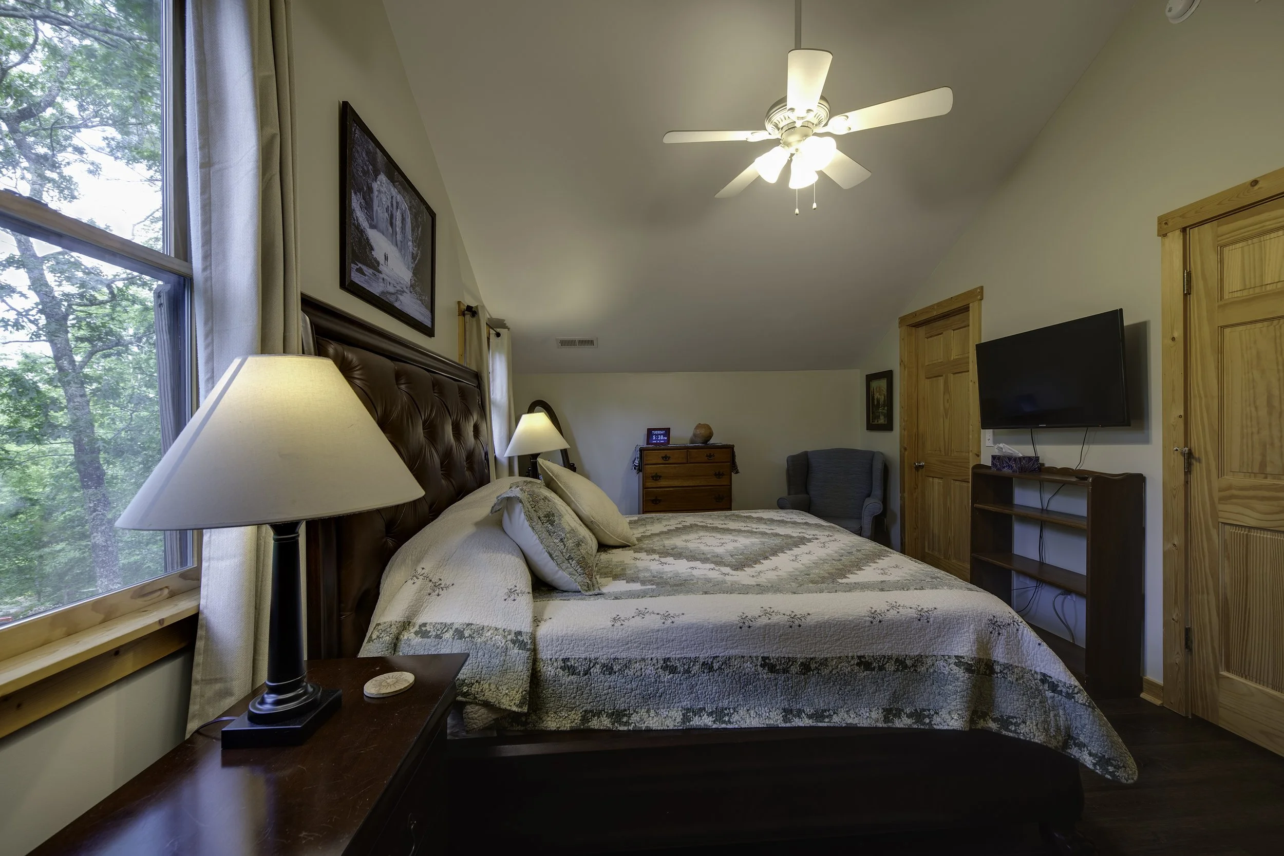 Second view of main bedroom with TV