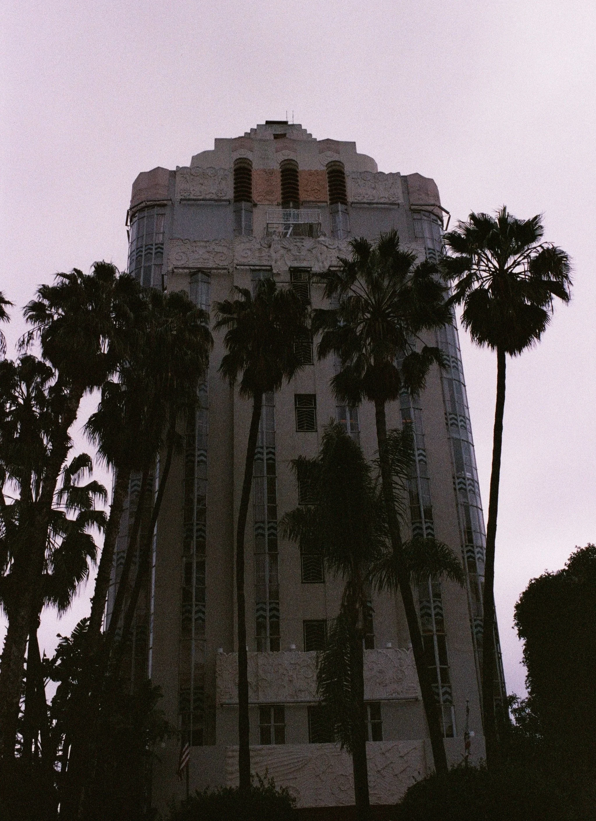 Art Deco tower with palm trees