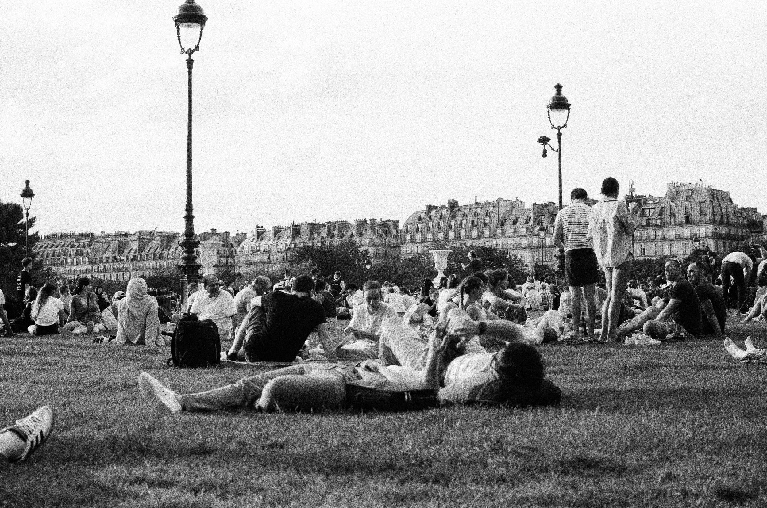 People gather in the gardens, analogue photograph
