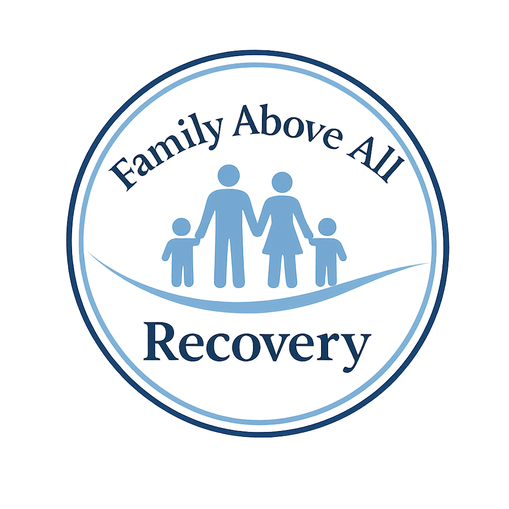 A blue circular logo with the text 'Family Above All' at the top and 'Recovery' at the bottom. In the center, there are stylized silhouettes of a family holding hands, representing unity and support.