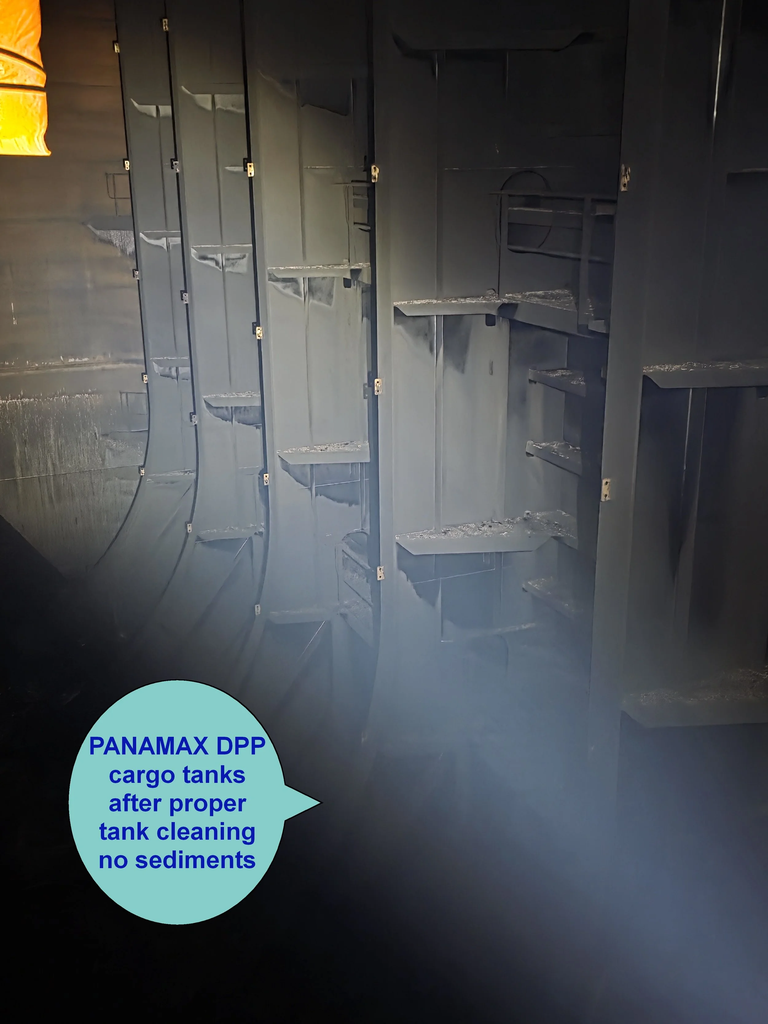 Empty cargo tanks with empty shelves, labeled as PANAMAX DPP cargo tanks after proper tank cleaning, with no sediments.