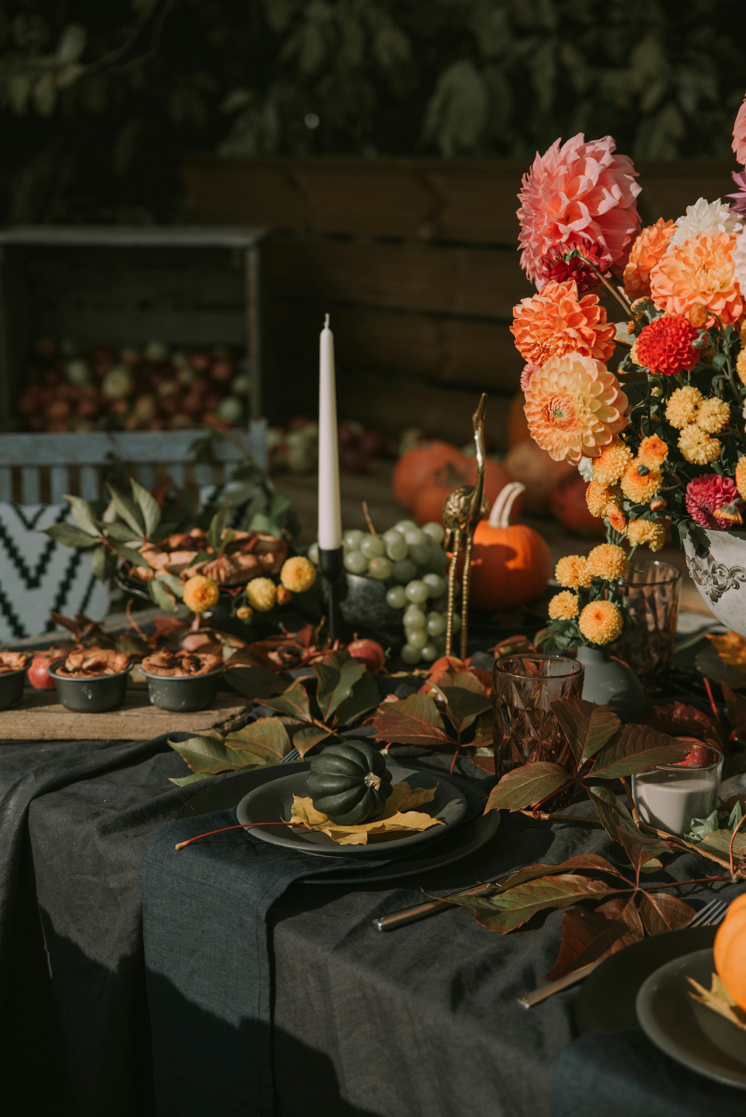 Cozy, layered interior featuring warm fall décor and unexpected seasonal color combinations