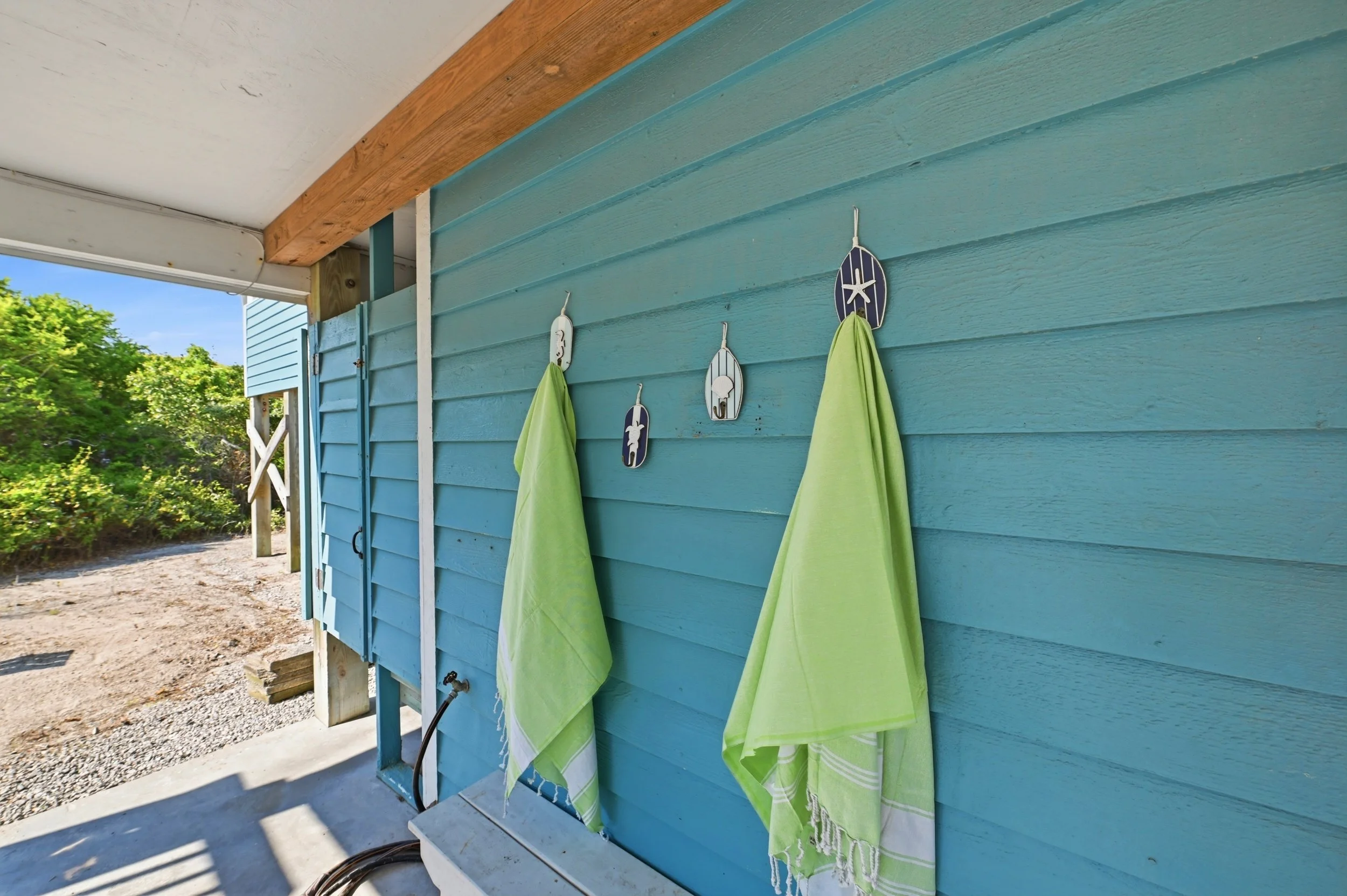 Airbnb design feature that helps a vacation rental stand out - wet towel storage