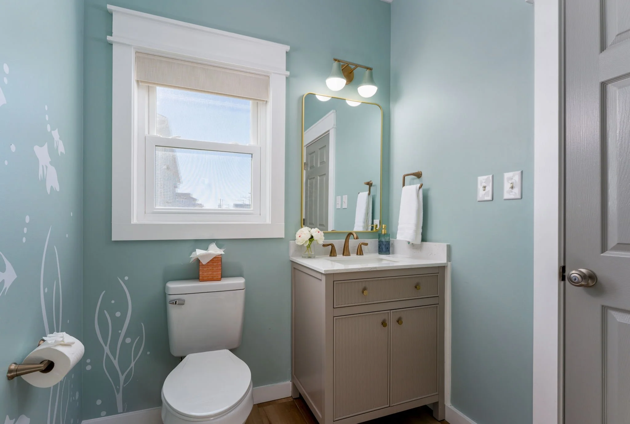 airbnb-design-powder-room-coastal-decals-beach-home-design.jpg