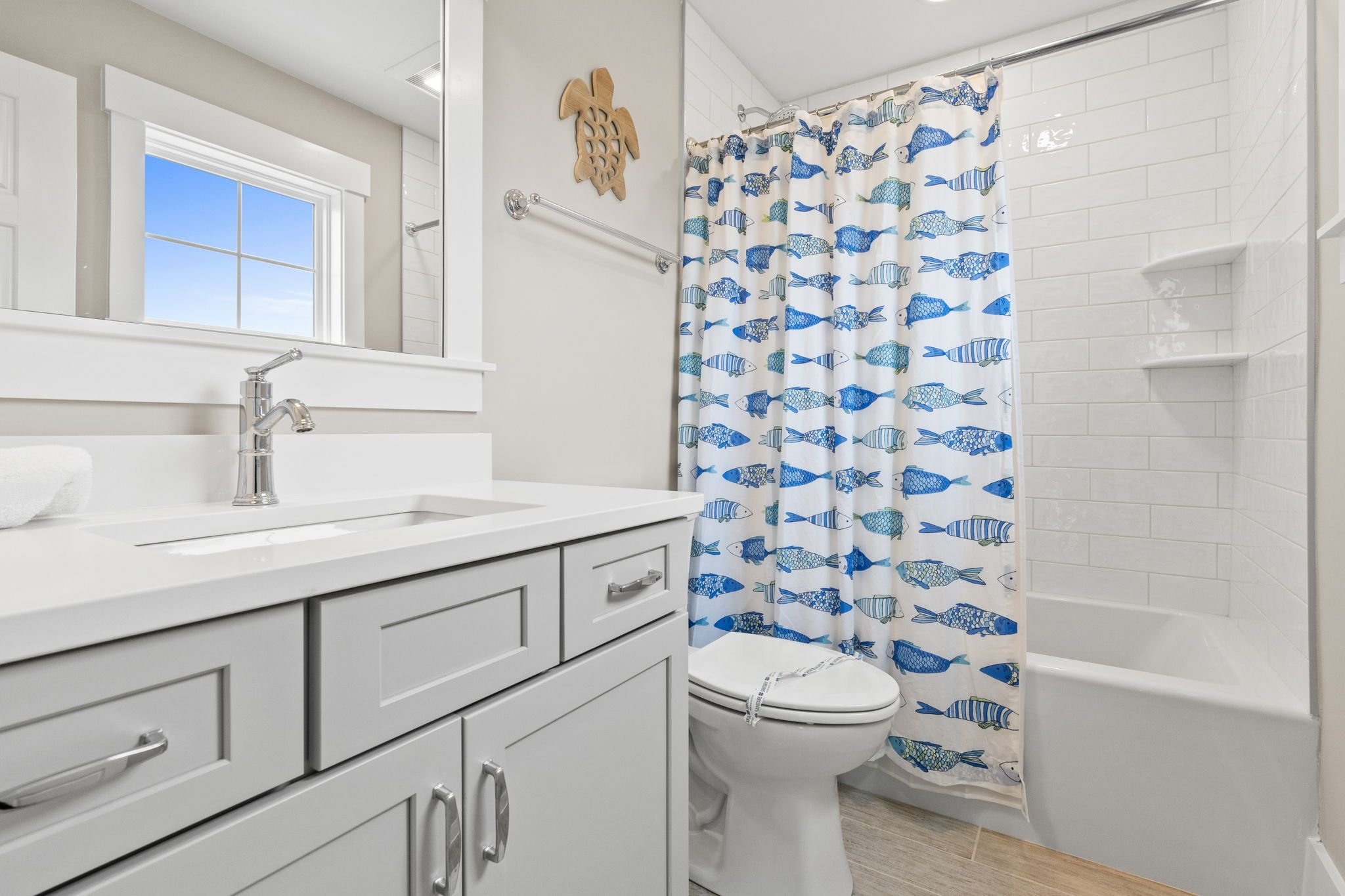 Beach Road Short Term Rental Bunk Room Full Bathroom 2 Design by Mickler & Co Oak Island, NC.jpg