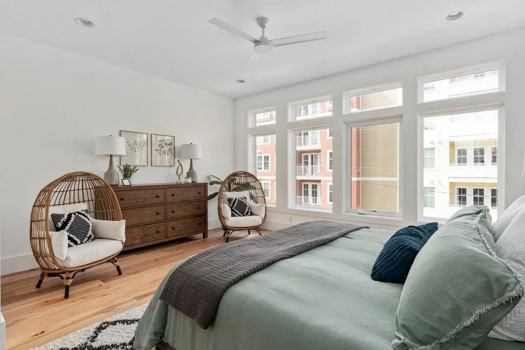 Coastal home interior with mixed wood tones