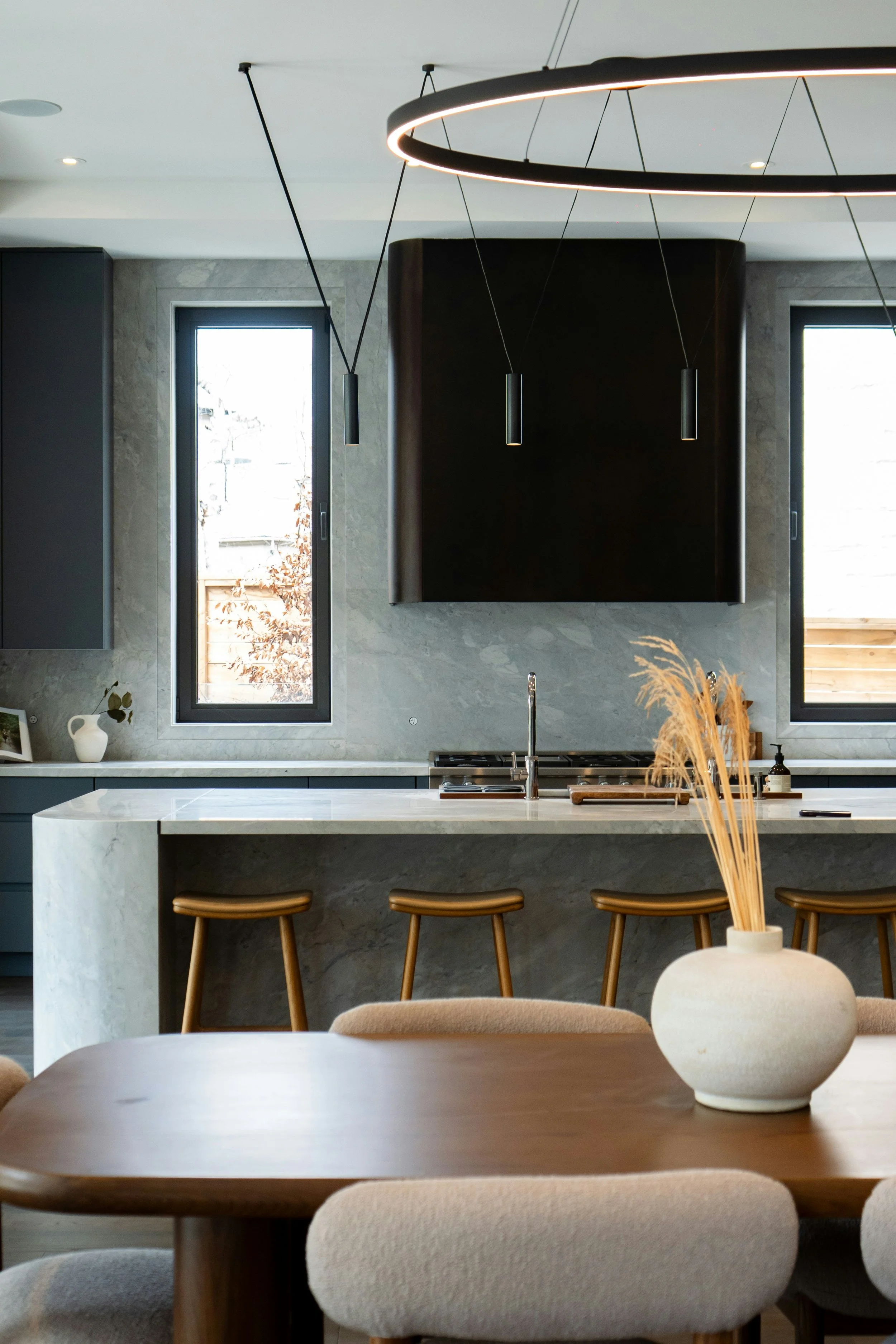Contemporary Kitchen with Black, Silver, and Brass Metal Accents