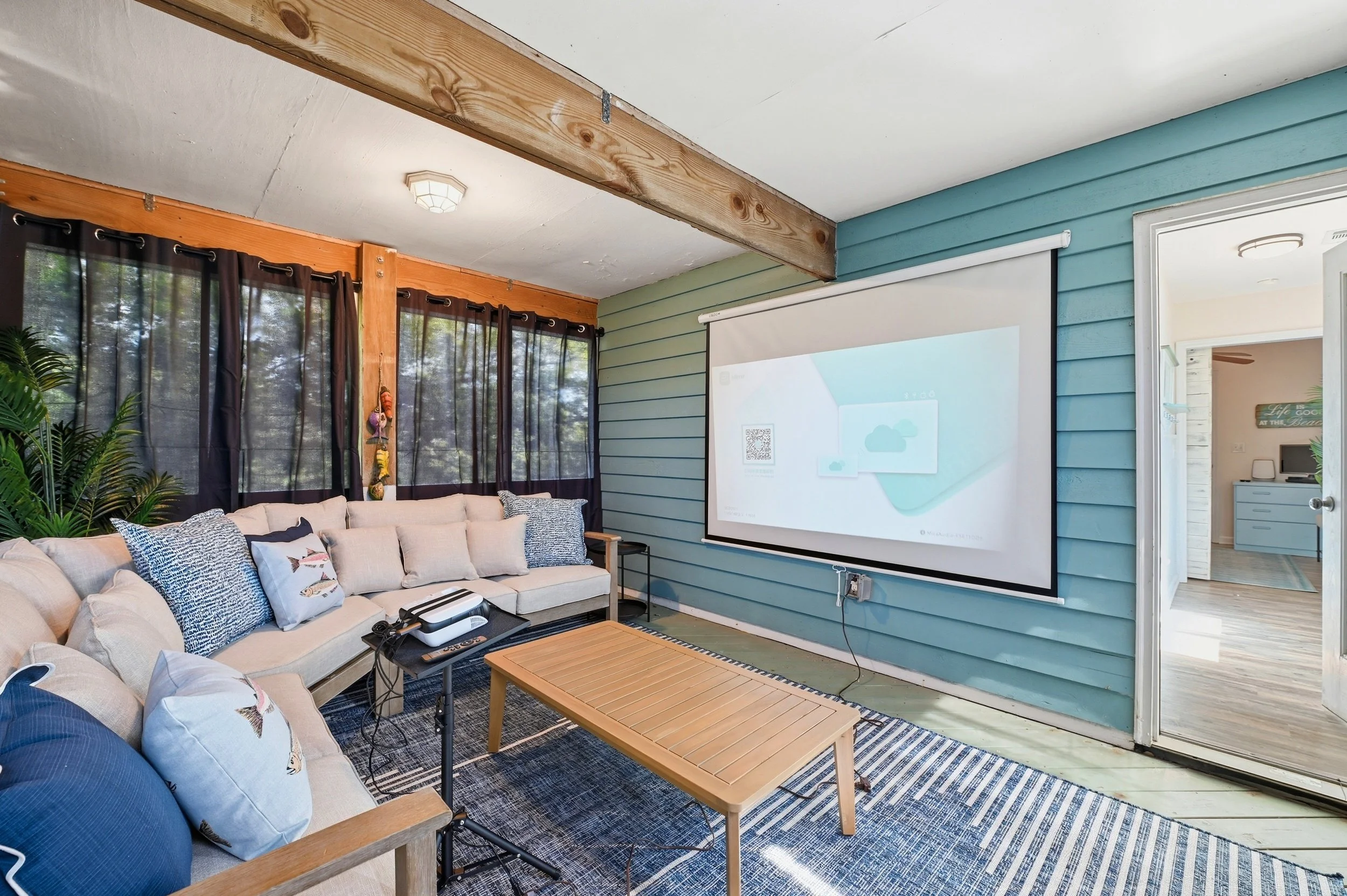 Airbnb design feature that helps a vacation rental stand out - theather room for rainy days or movie nights