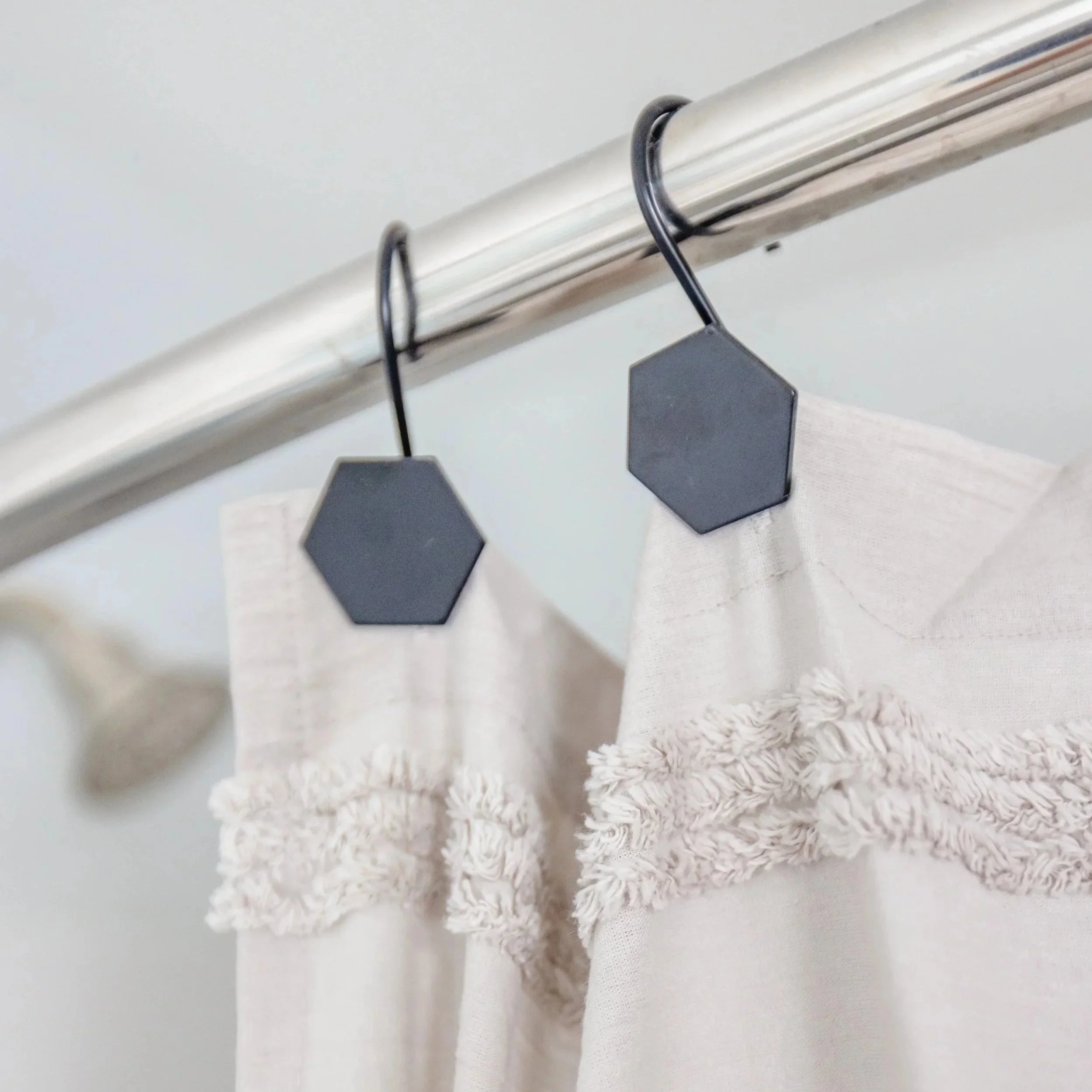 Silver Shower Curtain Rod with Matte Black Shower Hooks