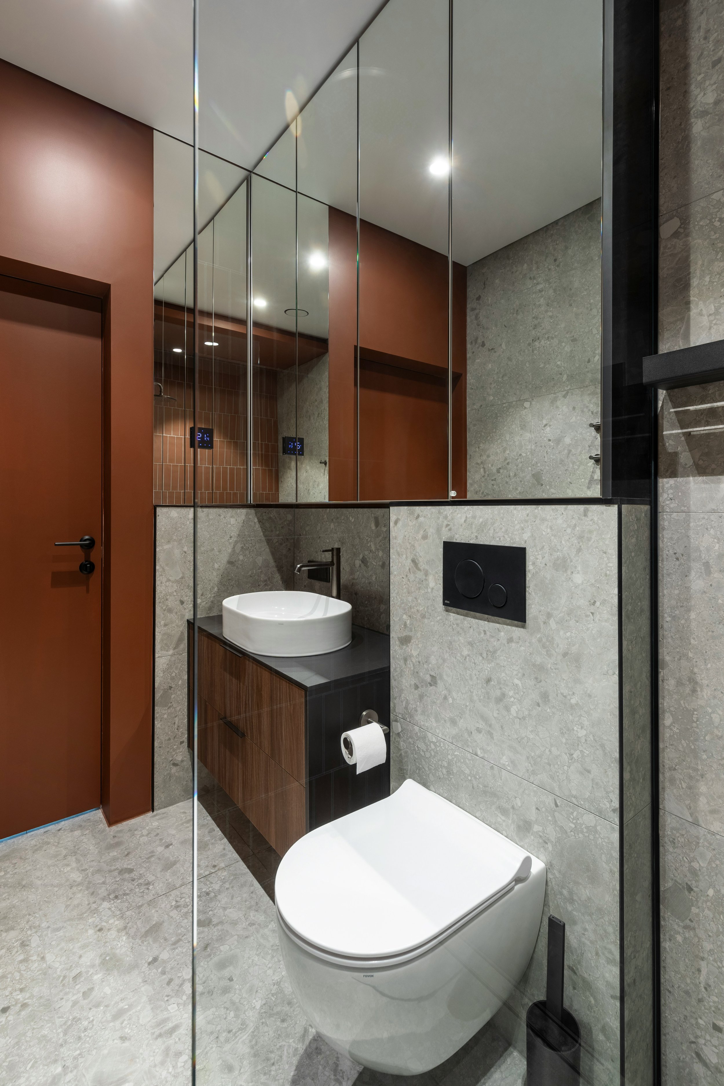 Full mirrored bathroom wall.