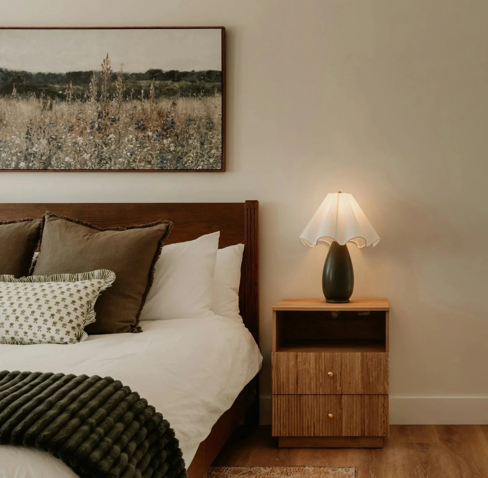Bedroom interior with mixed light and dark wood furniture and natural finishes