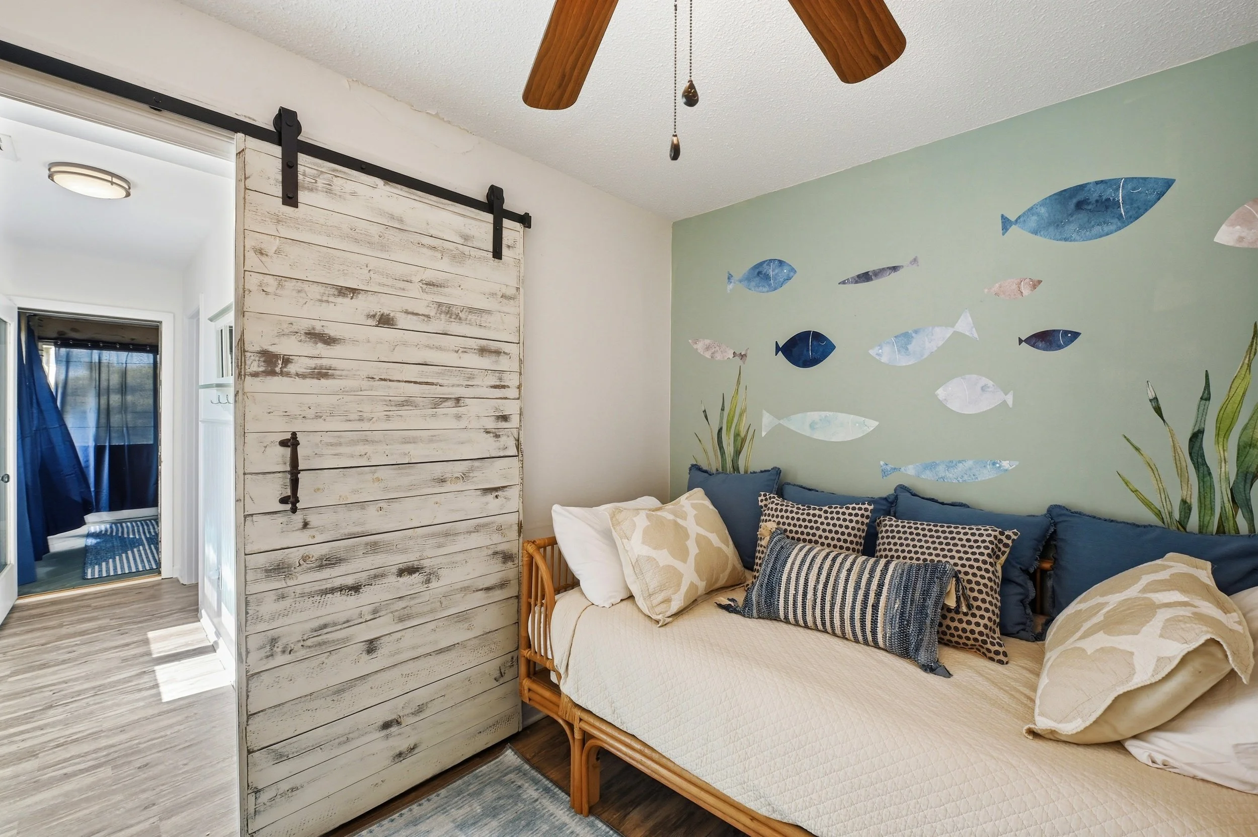 Airbnb design feature that helps a vacation rental stand out - ocean themed daybed room
