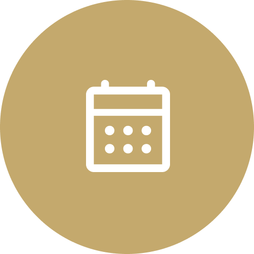 Icon of a calendar with a grid of days on a beige circular background.