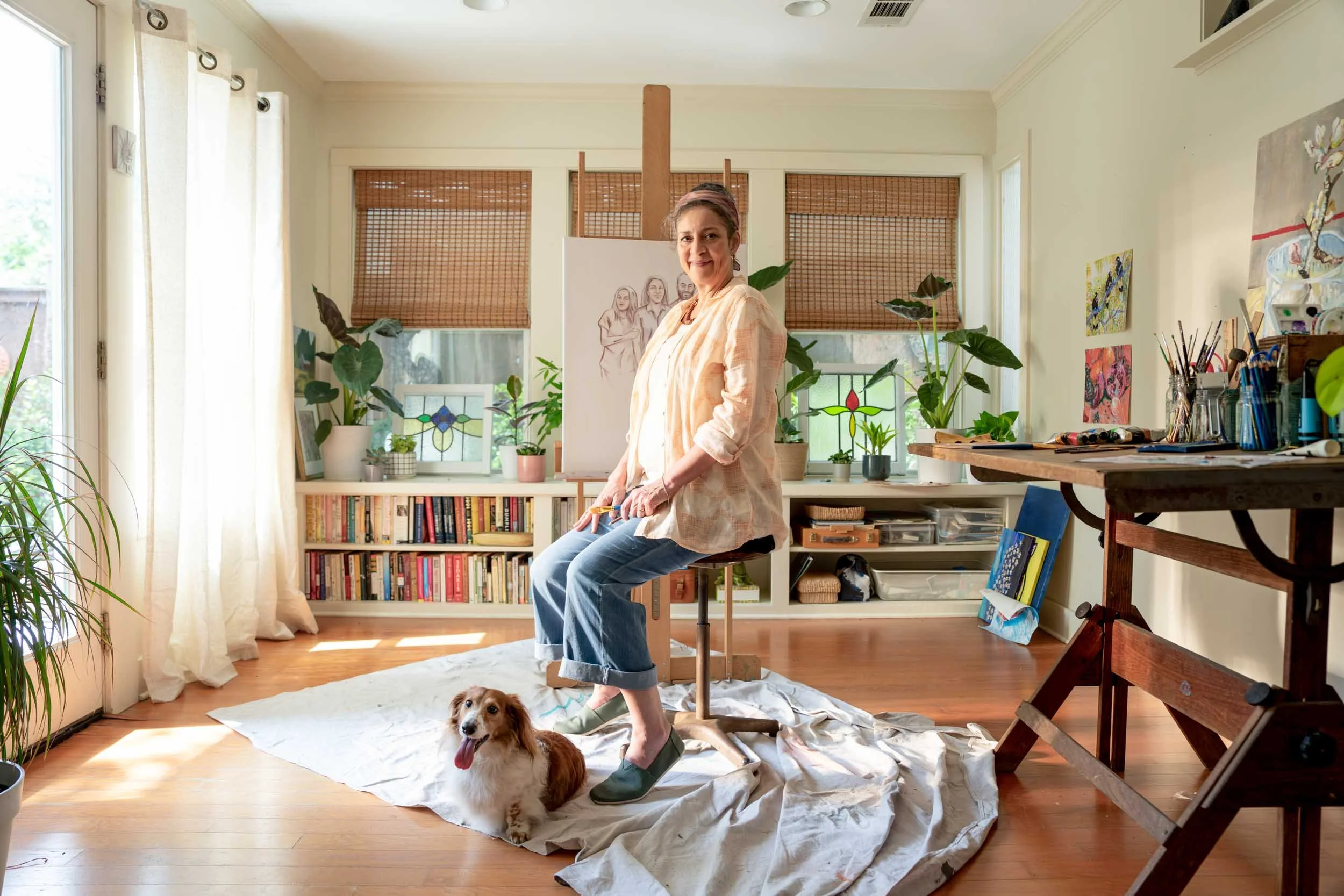 Artist-and-Dog-in-Sunlit-Art-Studio.jpg