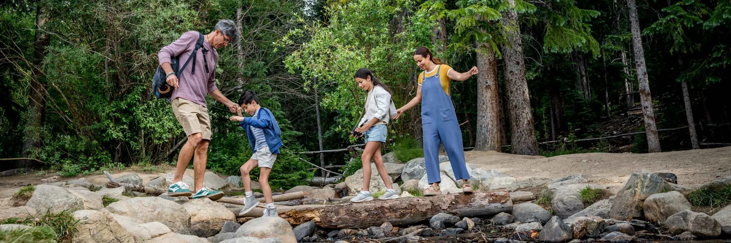 Family-Crossing-Rocky-Stream.jpg