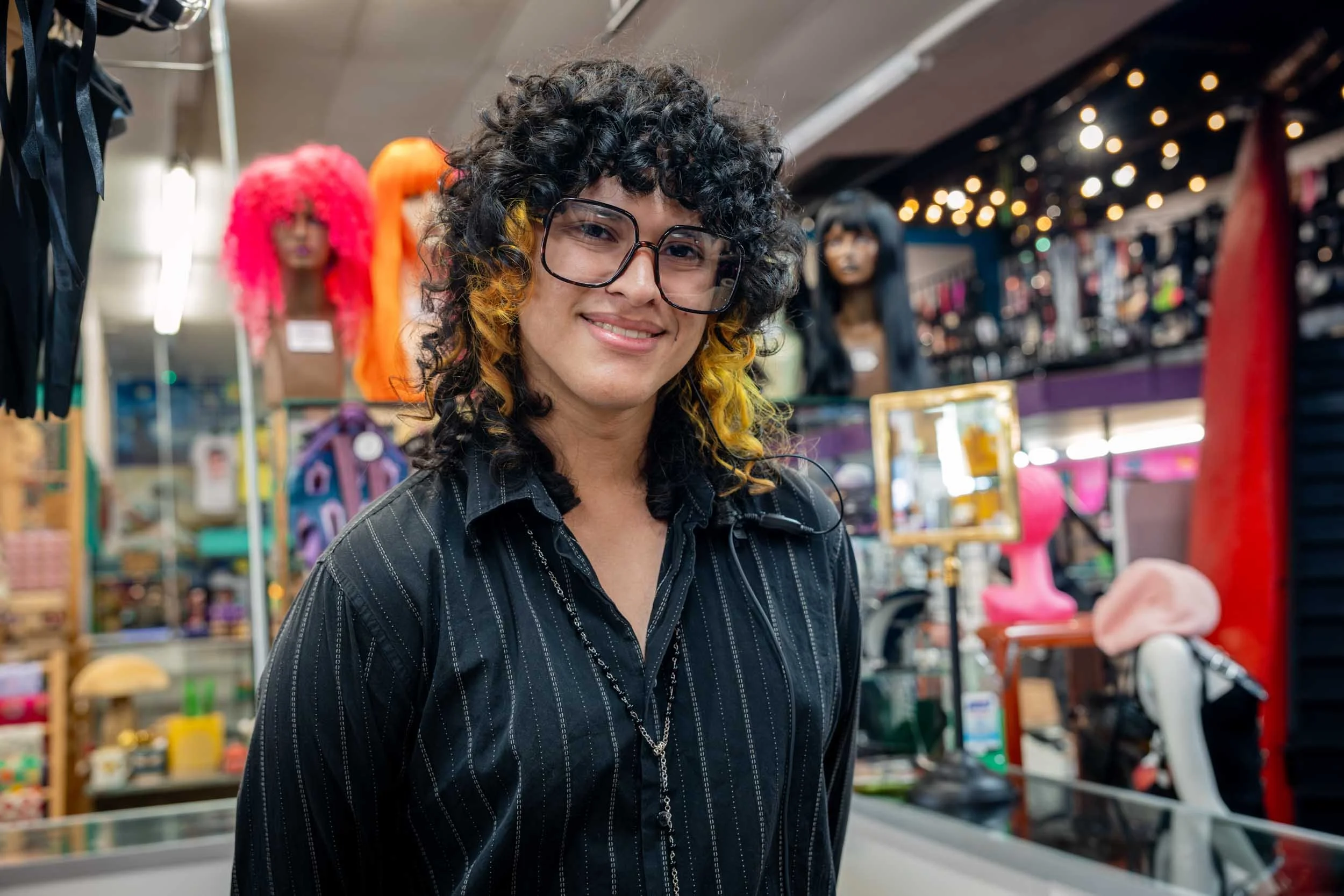 Smiling-person-in-wig-store.jpg