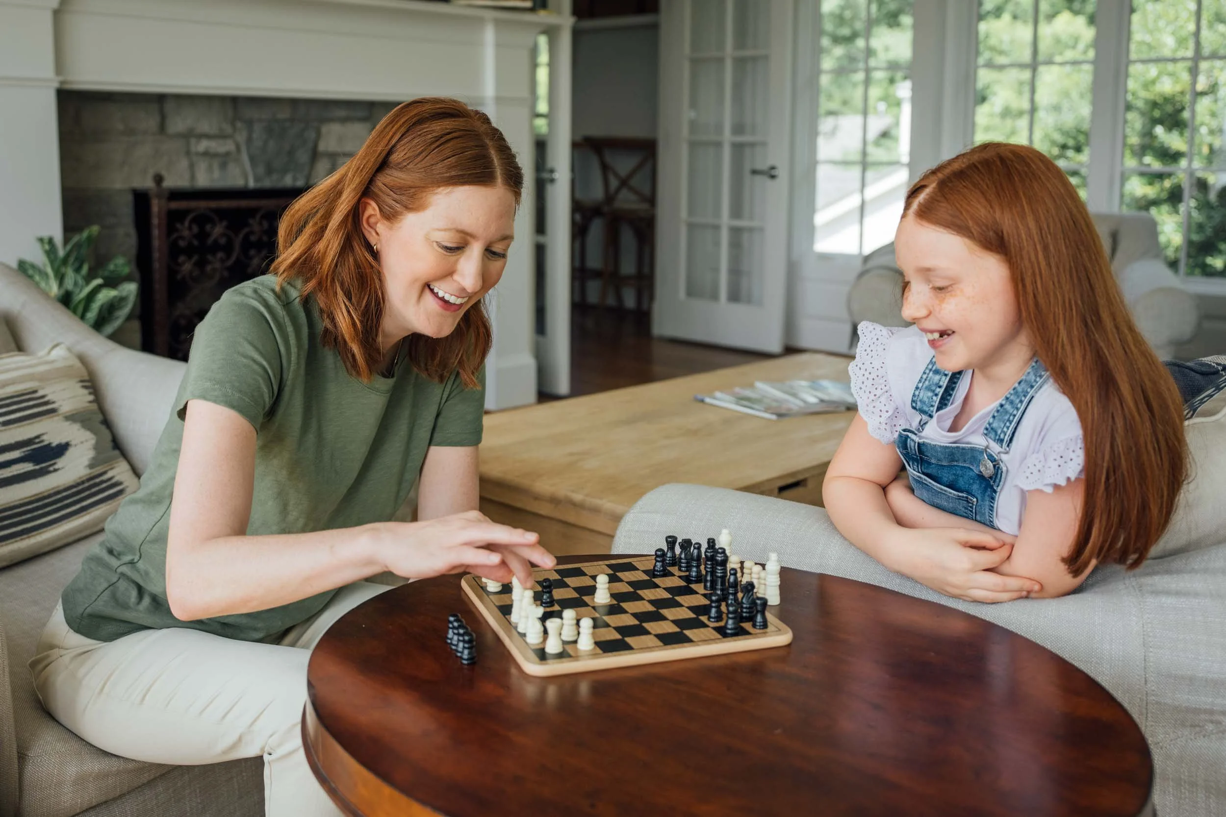 Woman-and-Girl-Playing-Chess-at-Home.jpg