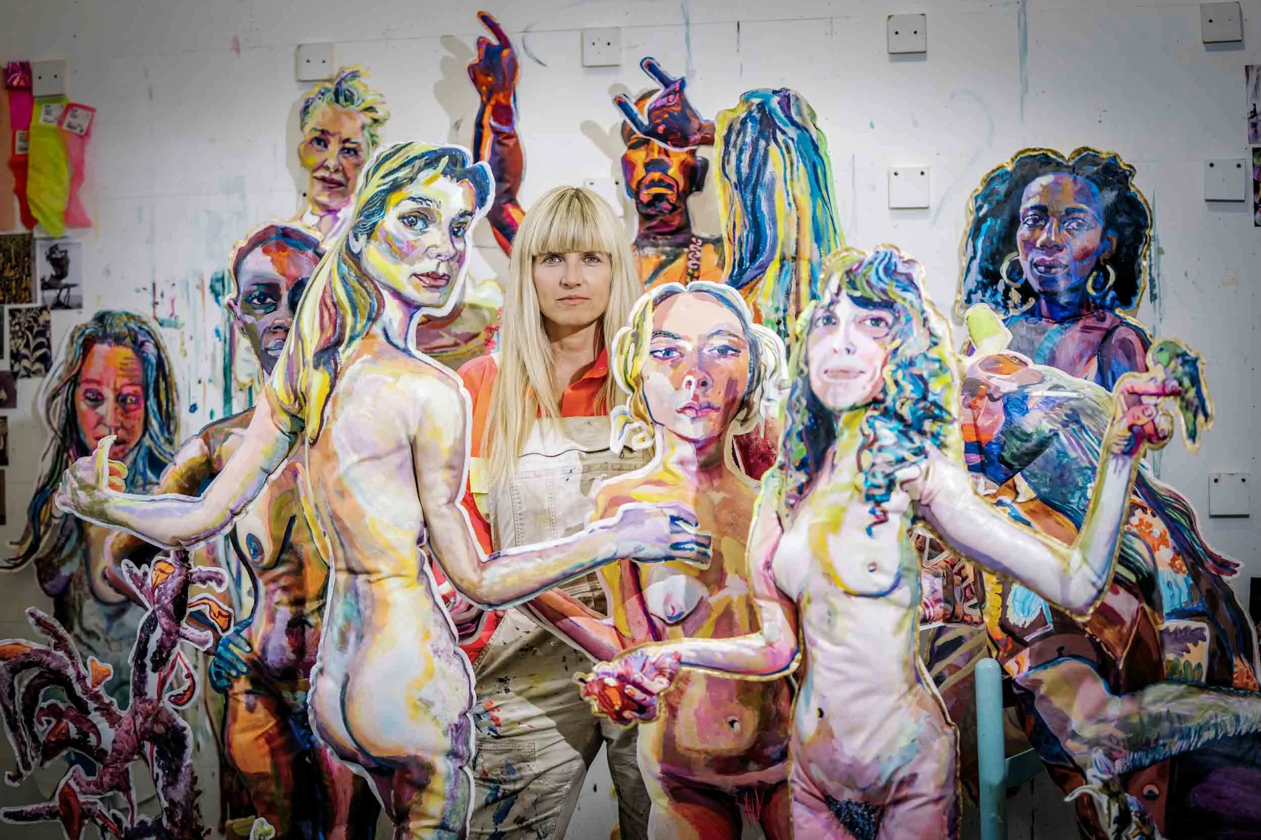 Artist-Elizabeth-Chapin-in-Studio-with-Painted-People.jpg