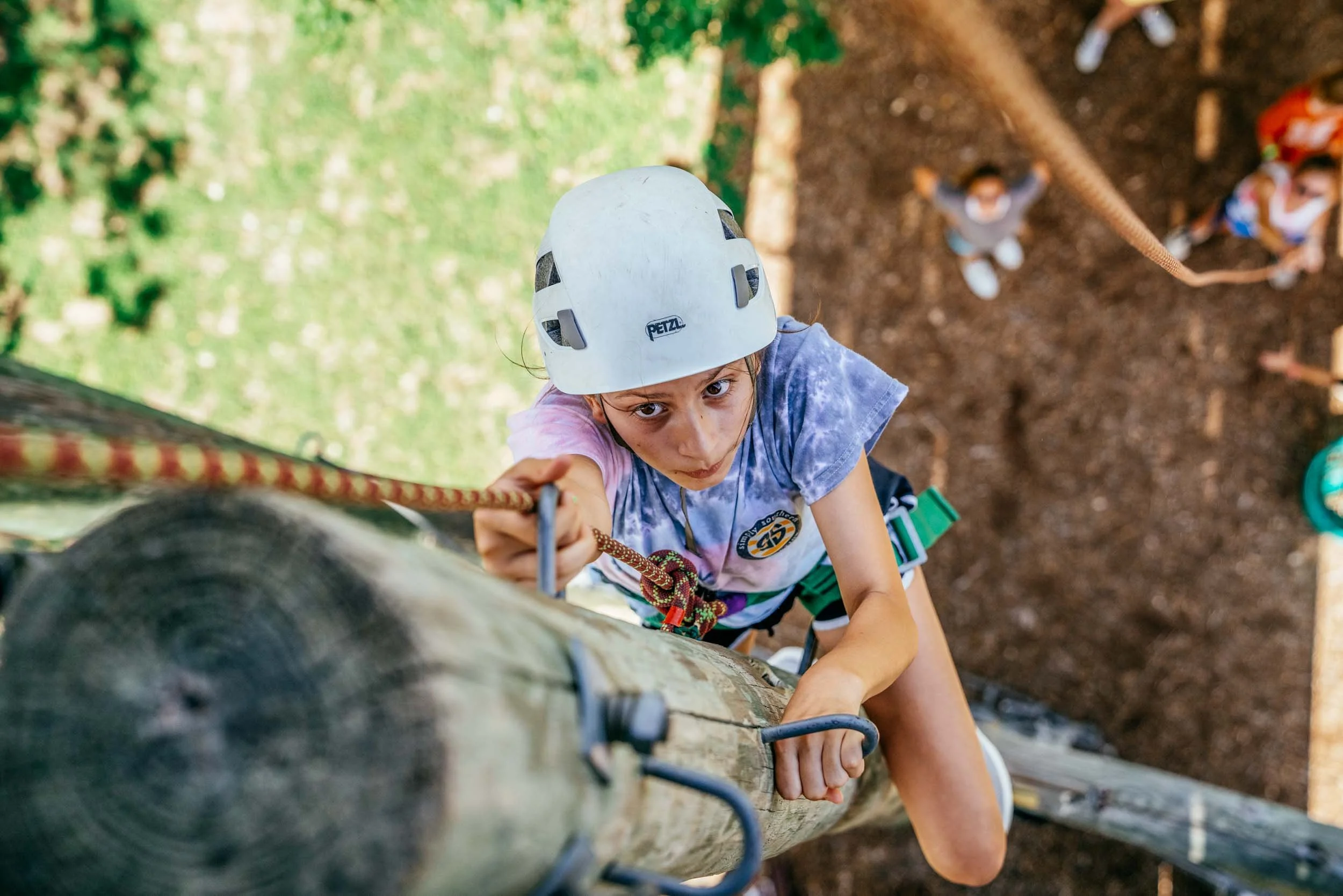 Teen-Girl-Climbing-Pole.jpg