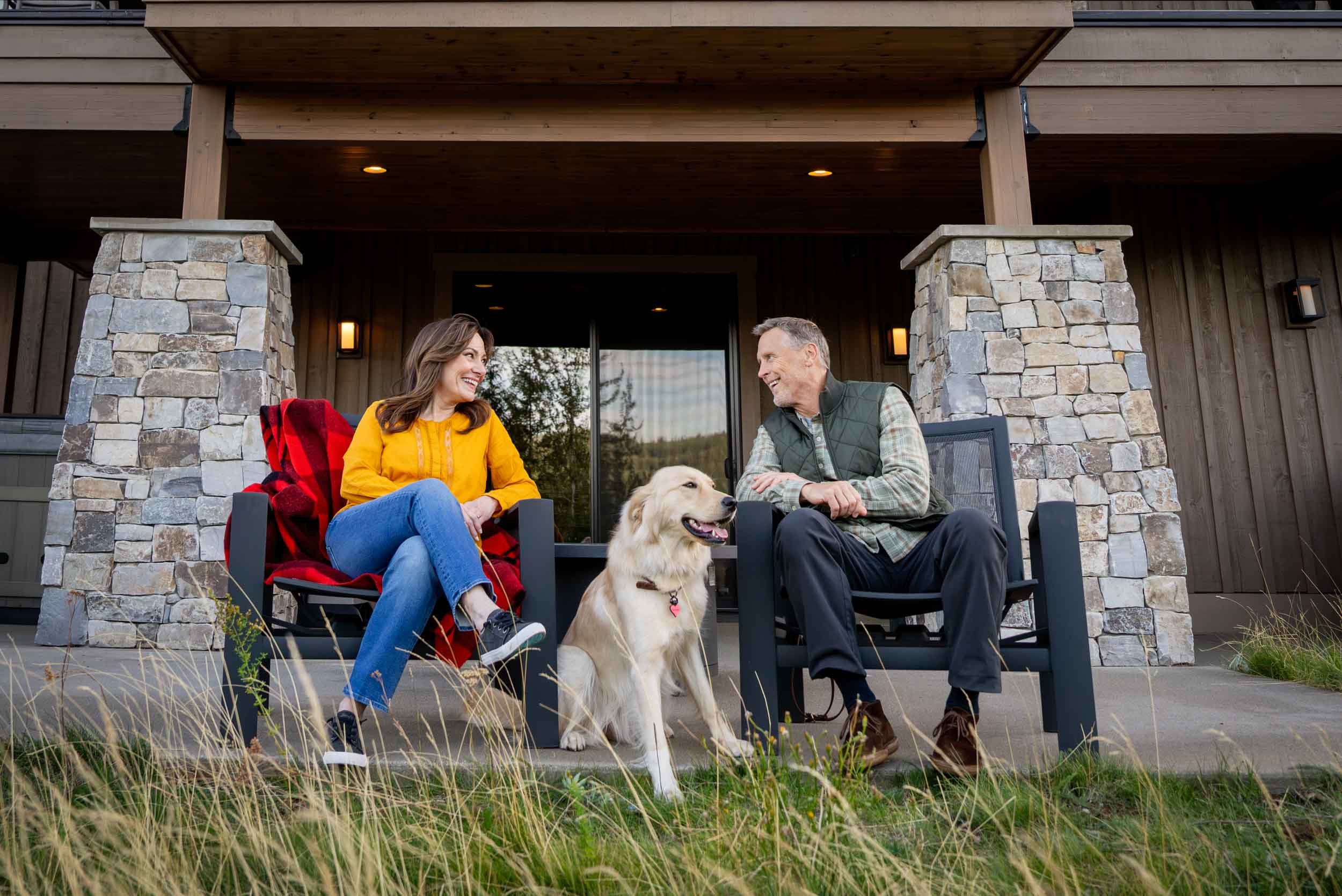 Couple-Relaxing-on-Porch-with-Dog.jpg
