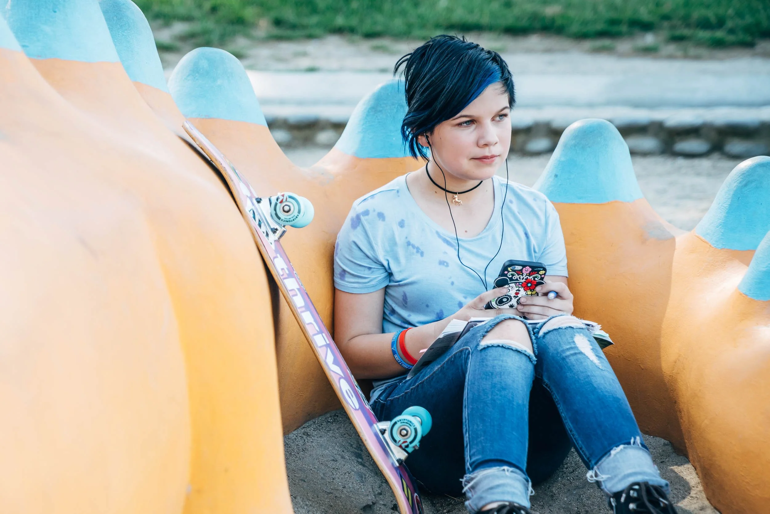 Transgender Teen in Park-journaling.jpg