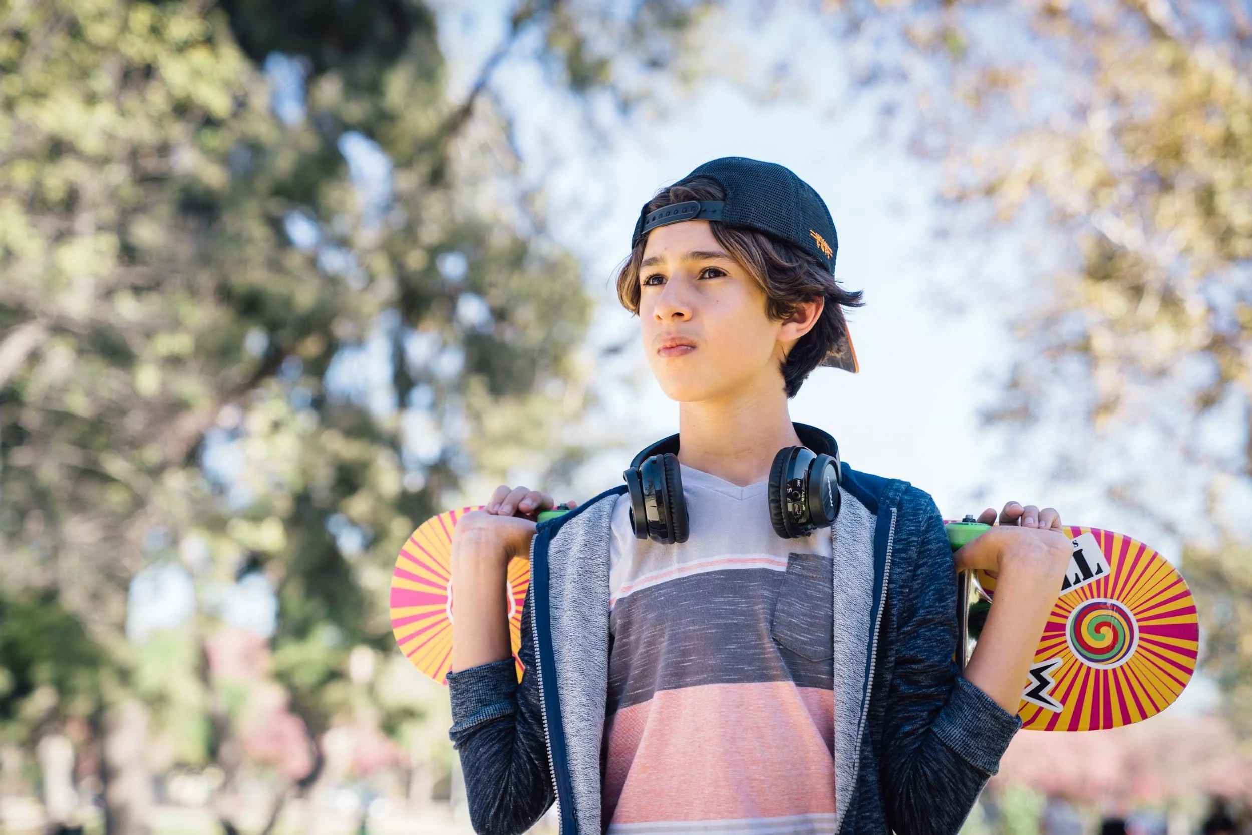 Teen-with-Skateboard-and-Headphones.jpg